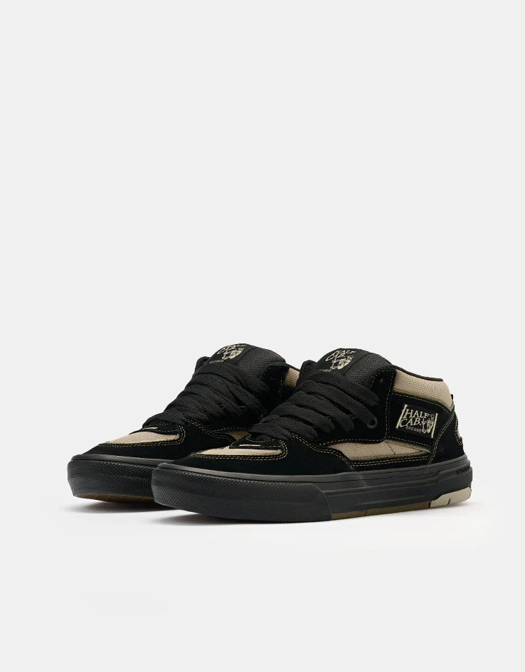 Vans Skate Half Cab Wafflecup shoe in black and peyote with classic skate shoe design, durable rubber sole, and skate-ready style.