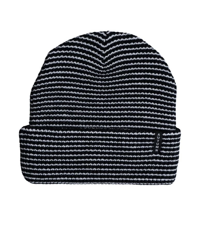 Autumn Stripe Beanie worn by a man and woman, featuring colorful autumn stripes and a cozy knit texture.