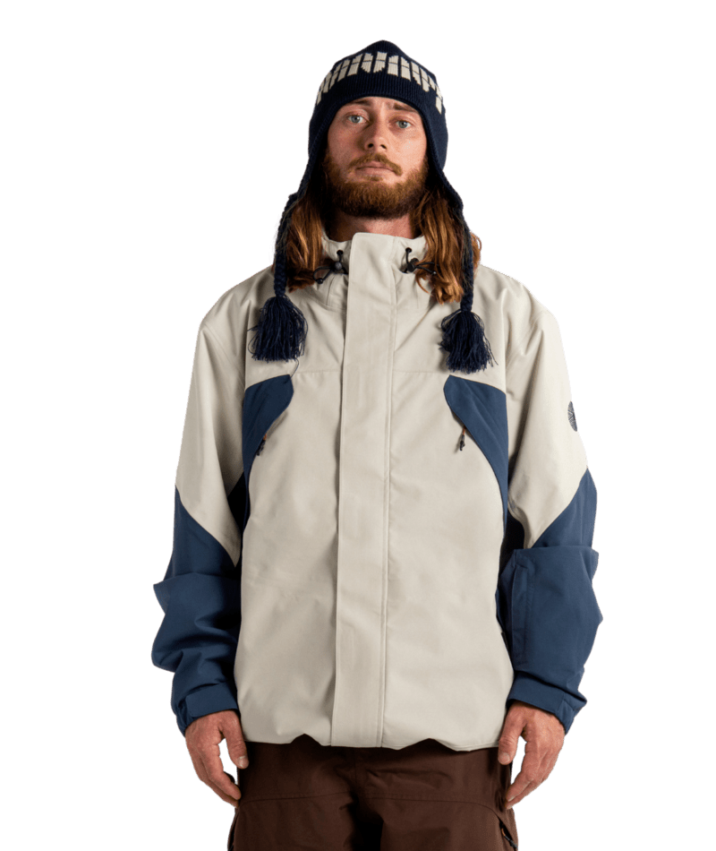 Autumn Camber 3L snow jacket for men and women, waterproof and insulated, shown in a stylish winter outdoor setting.