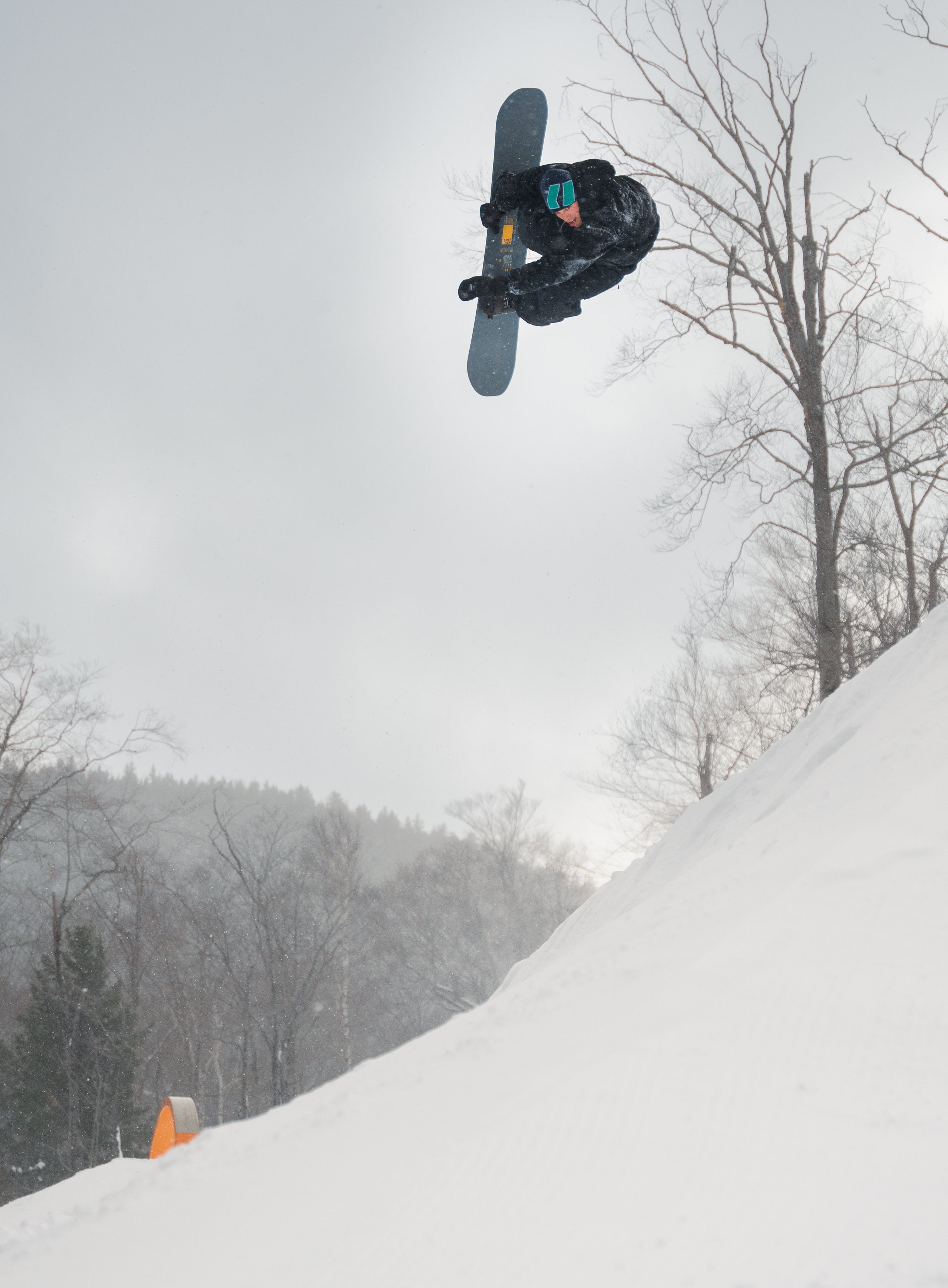 Armada Beatnik LTD snowboard designed for snowboarding, showcasing its graphic top sheet with vibrant colors and detailed graphics.