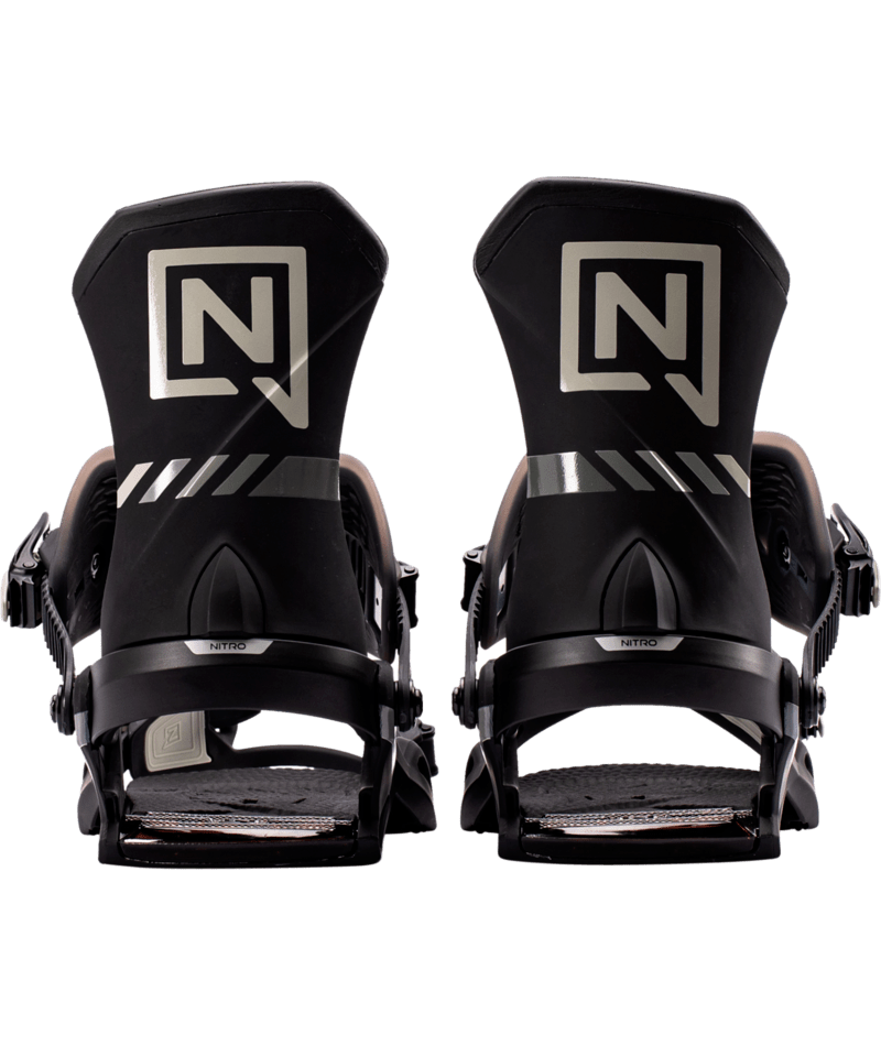 Nitro Team Pro snowboard bindings mounted on a snowboard, featuring adjustable straps and high-quality construction for snowboarding.