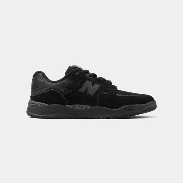 New Balance Numeric Tiago 1010 skate shoes in black with black accents, featuring a sleek sneaker design and durable construction.