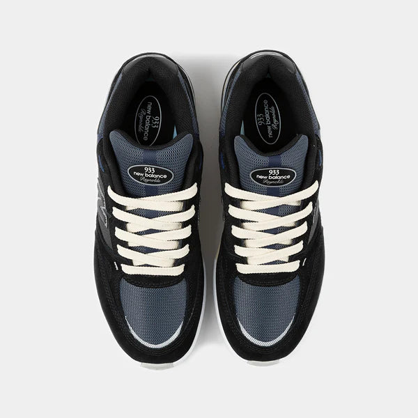 New Balance Numeric 933 Andrew Reynolds shoes in black and navy with sleek design and skateboarding style.