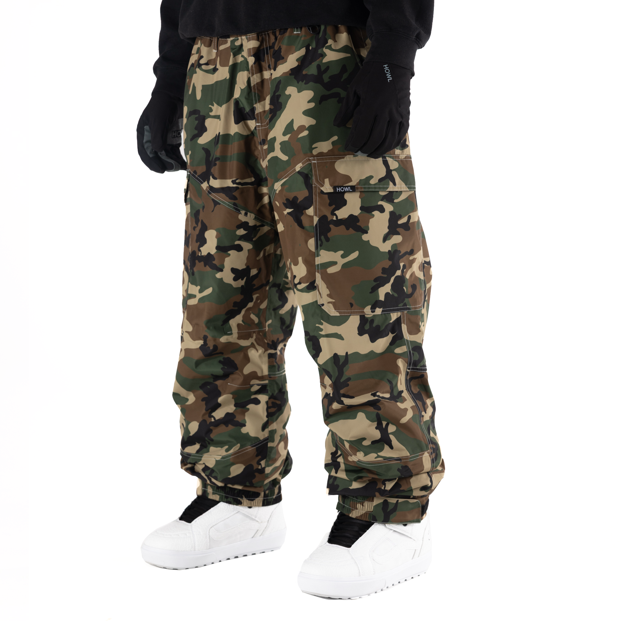 Howl insulated cargo pant in camo, men's and women's outdoor pants with durable fabric and insulated lining for warmth.