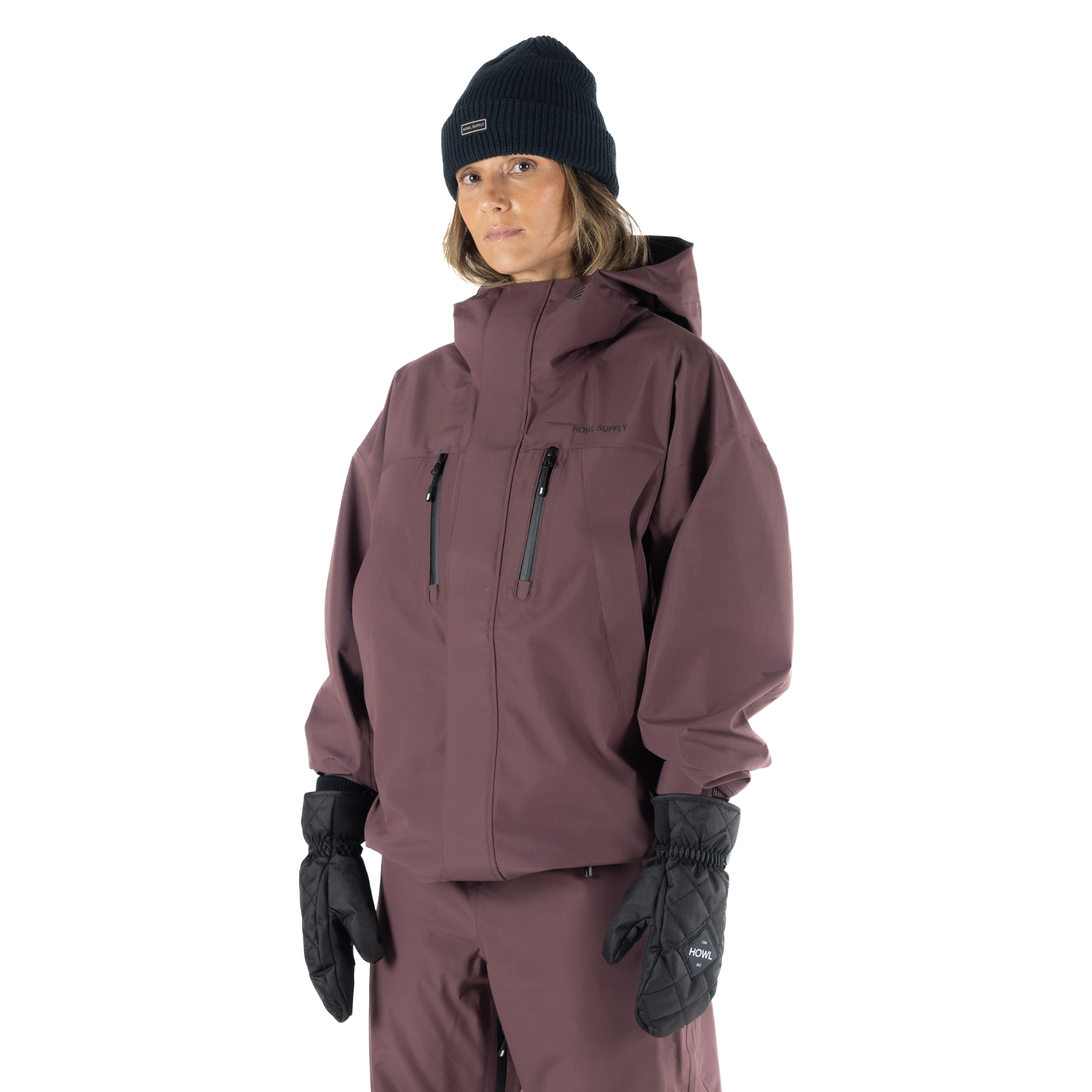 Howl Shell Jacket in plum color, unisex men's and women's waterproof shell outerwear with adjustable hood and zip pockets.