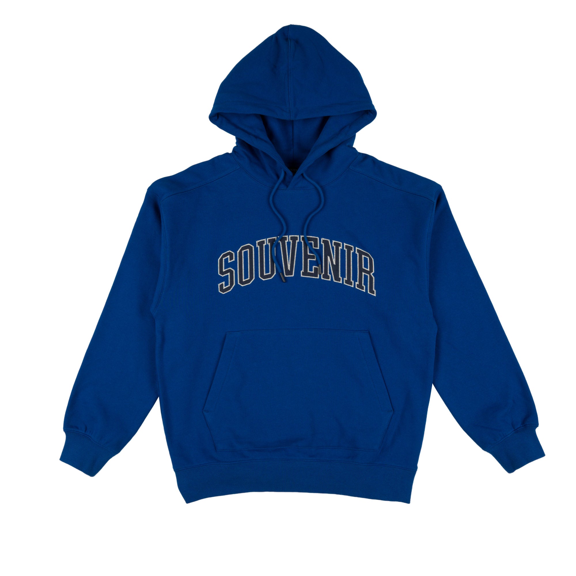 A royal blue pullover hoodie with 'SOUVENIR' printed in arched varsity block letters across the chest, outlined in gold and dark navy. The hoodie features a front kangaroo pocket and drawstring hood, shown against a plain white background.