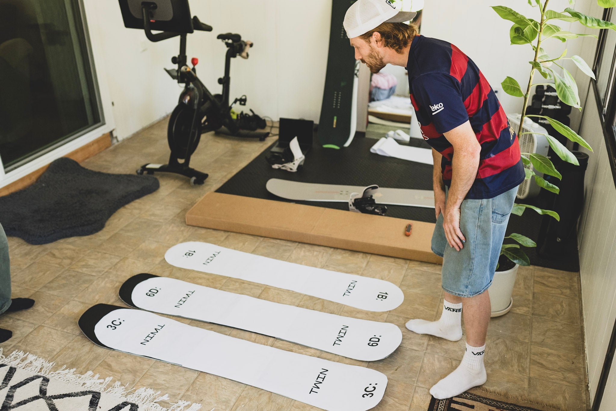 Armada Beatnik LTD snowboard with intricate graphic design, showcasing its sleek shape and durable construction for snowboarding.