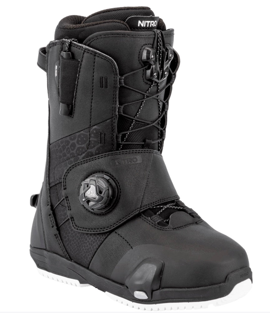 Nitro Monarch Step On TLS women's snowboard boots for snowboarding, featuring black and white design with buckles and padding.
