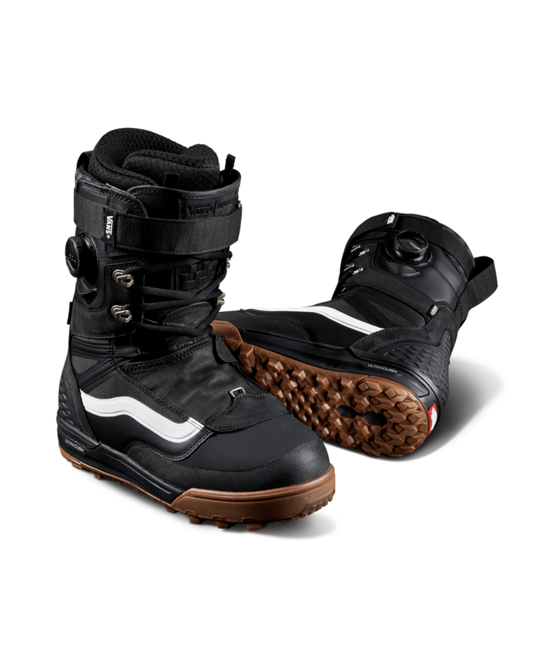 Vans Infuse men's snowboard boot in black with blue accents, featuring sturdy laces and padded ankle support for snowboarding.