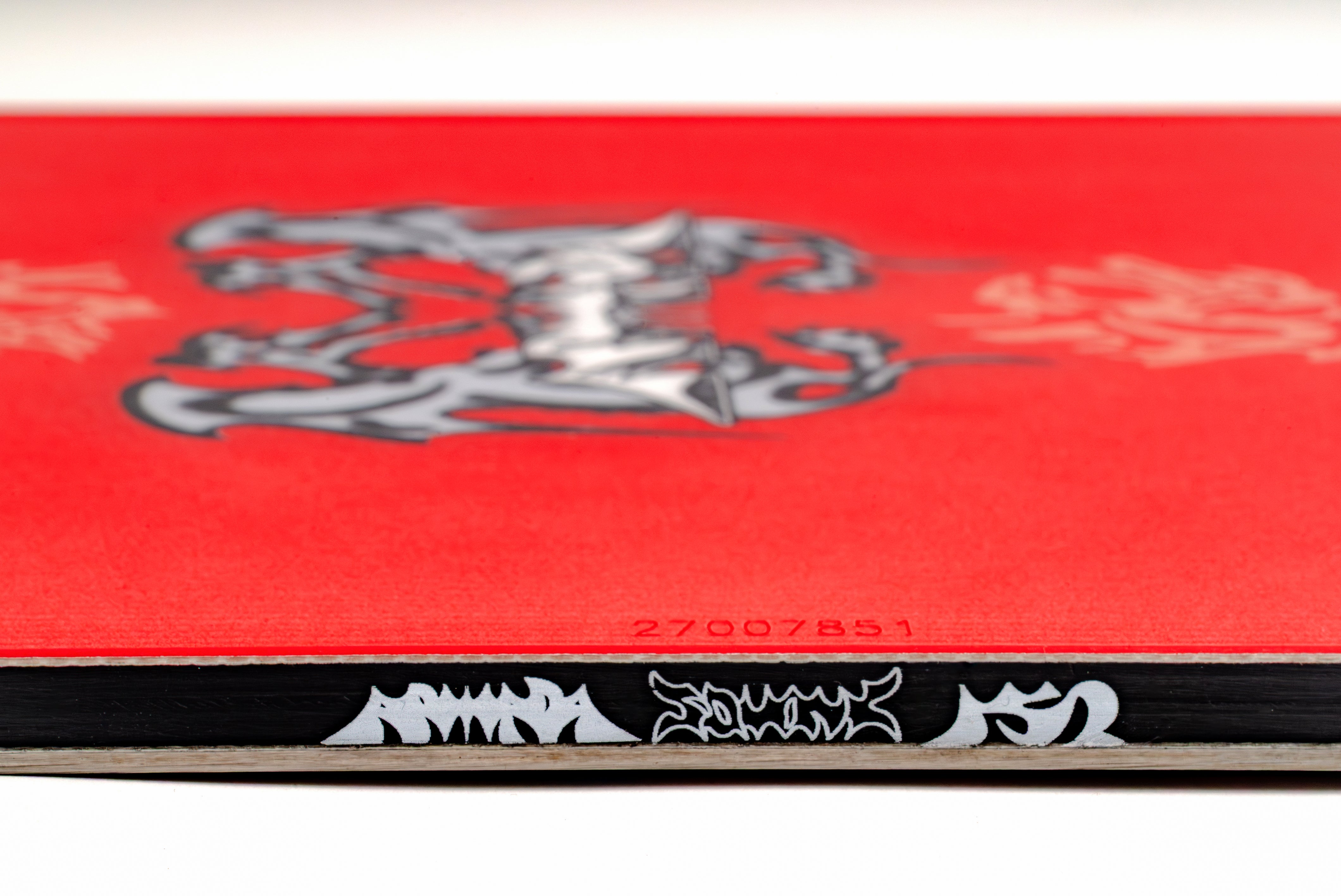 Armada Squonk snowboard shown from sidewall view, featuring its snowboard design and construction details.