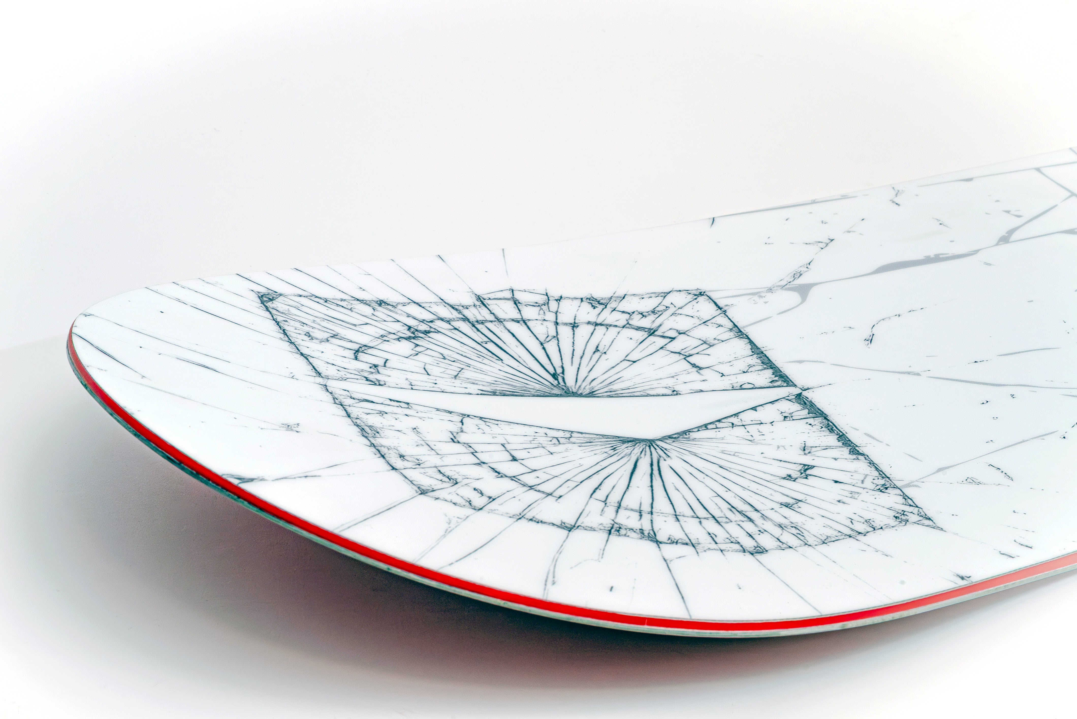 Nose of the Armada Beatnik snowboard, showing the early-rise rocker tip.