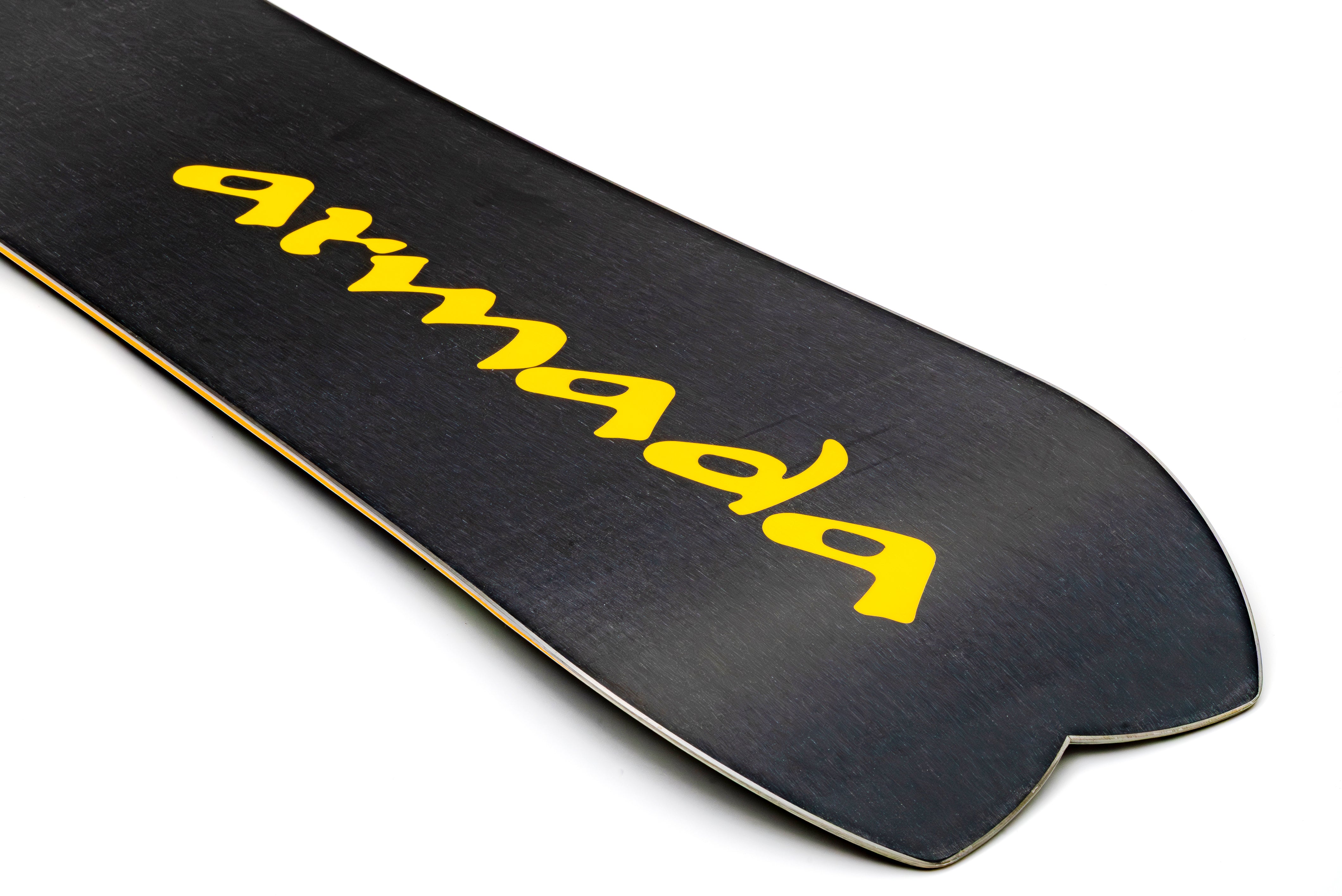 Armada Kure Women's Snowboard 2027 showing the base and tail with a sleek design and graphics on snow.