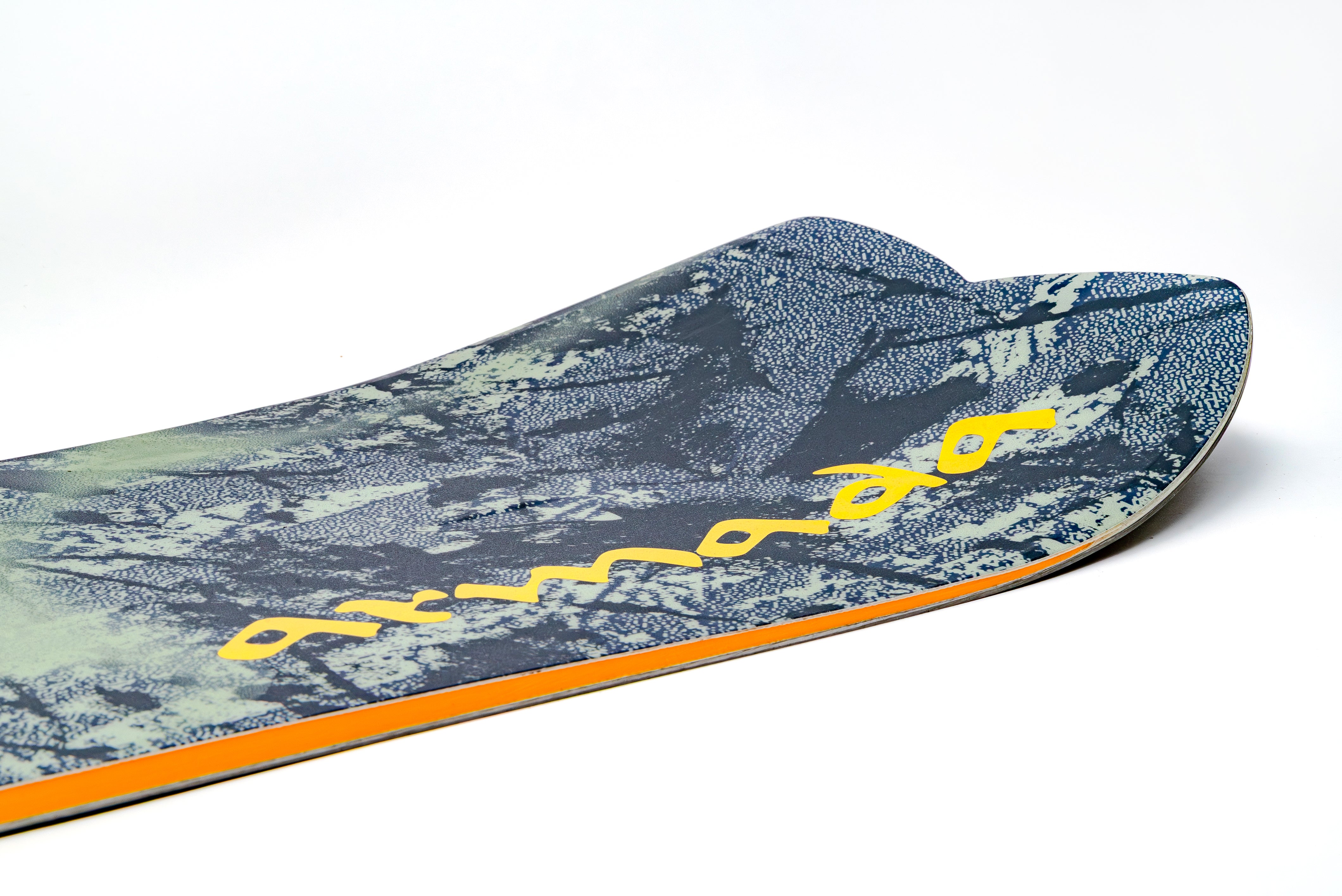 Armada Kure women's snowboard with a sleek tail design, perfect for all-mountain snowboarding adventures.