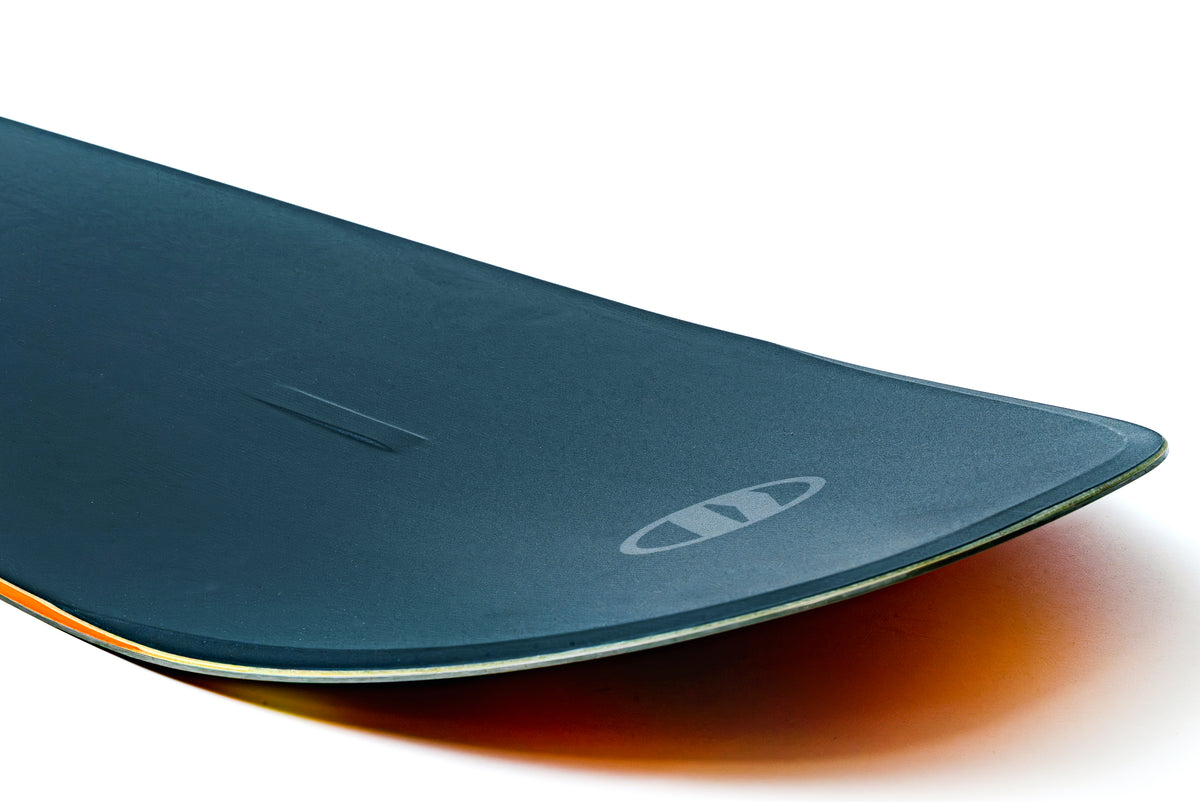 Armada Shatter Point snowboard showing the nose and topsheet design, optimized for snowboarding performance and style.