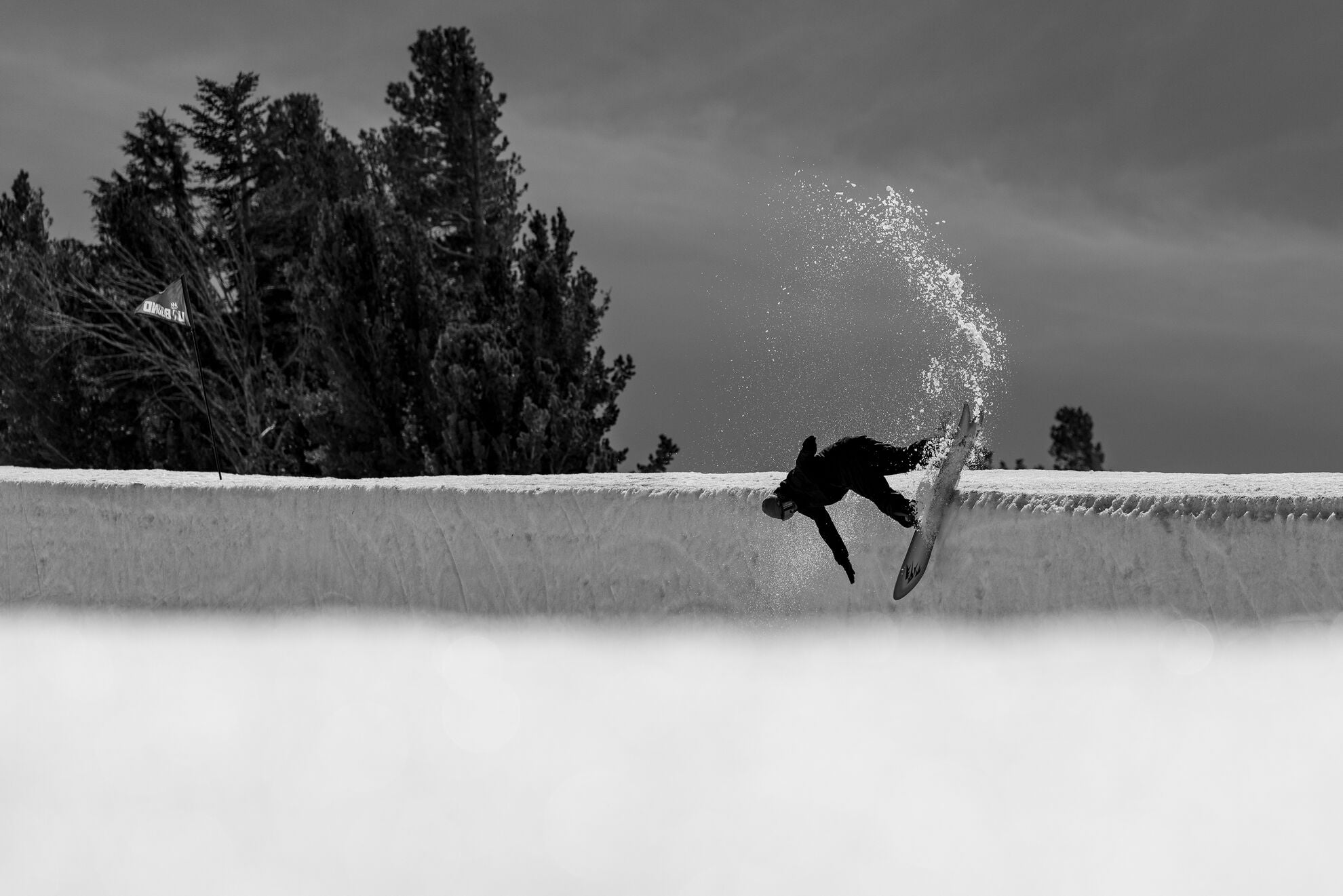 Jones Mens Tweaker 2 snowboard in action, showcasing its design and construction for versatile snowboarding performance.