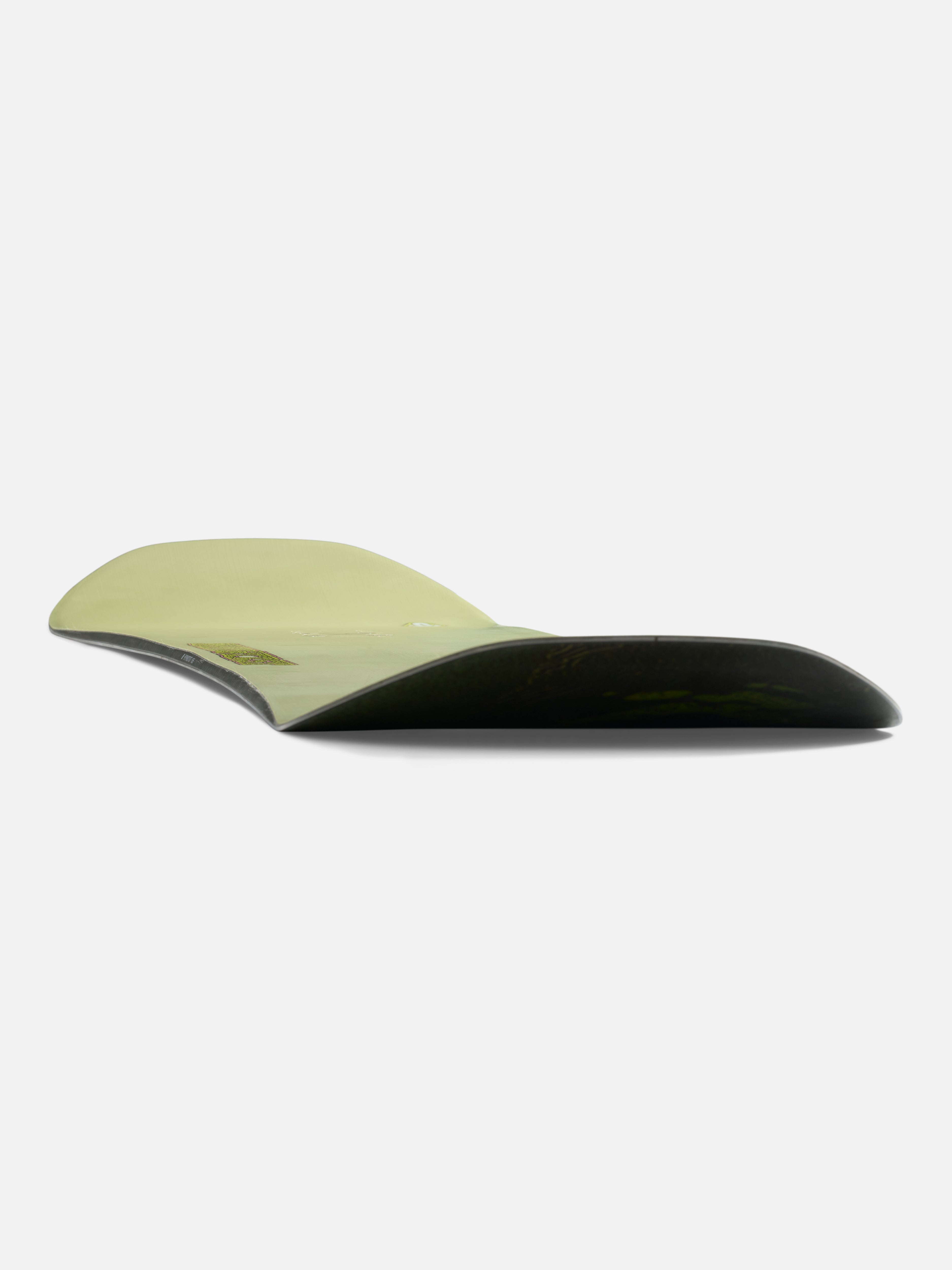 K2 Hypnotist snowboard for 2027 in snow, shown from a low angle with bindings, designed for all-mountain riding.