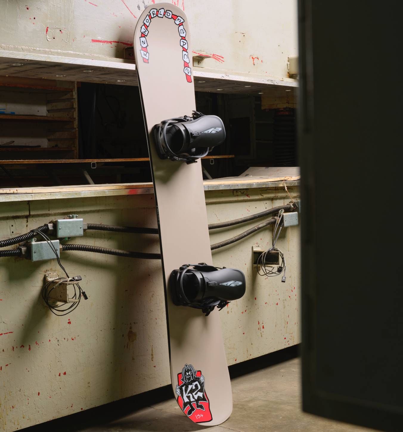 K2 World Peace Snowboard 2027 with factory finish and detailed graphics, designed for snowboarding performance and style.