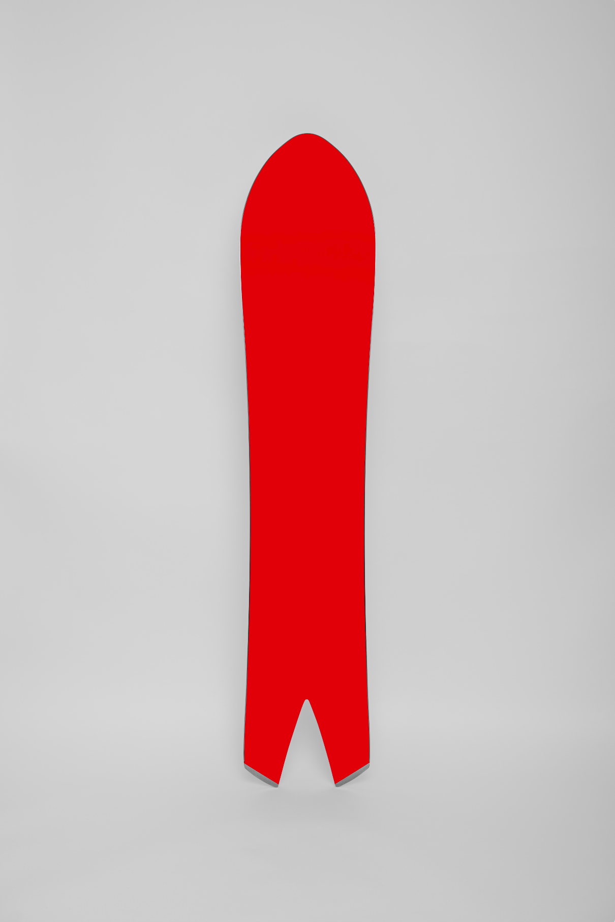 Korua Dart snowboard with a colorful base design, perfect for snowboarding enthusiasts seeking high-performance gear.