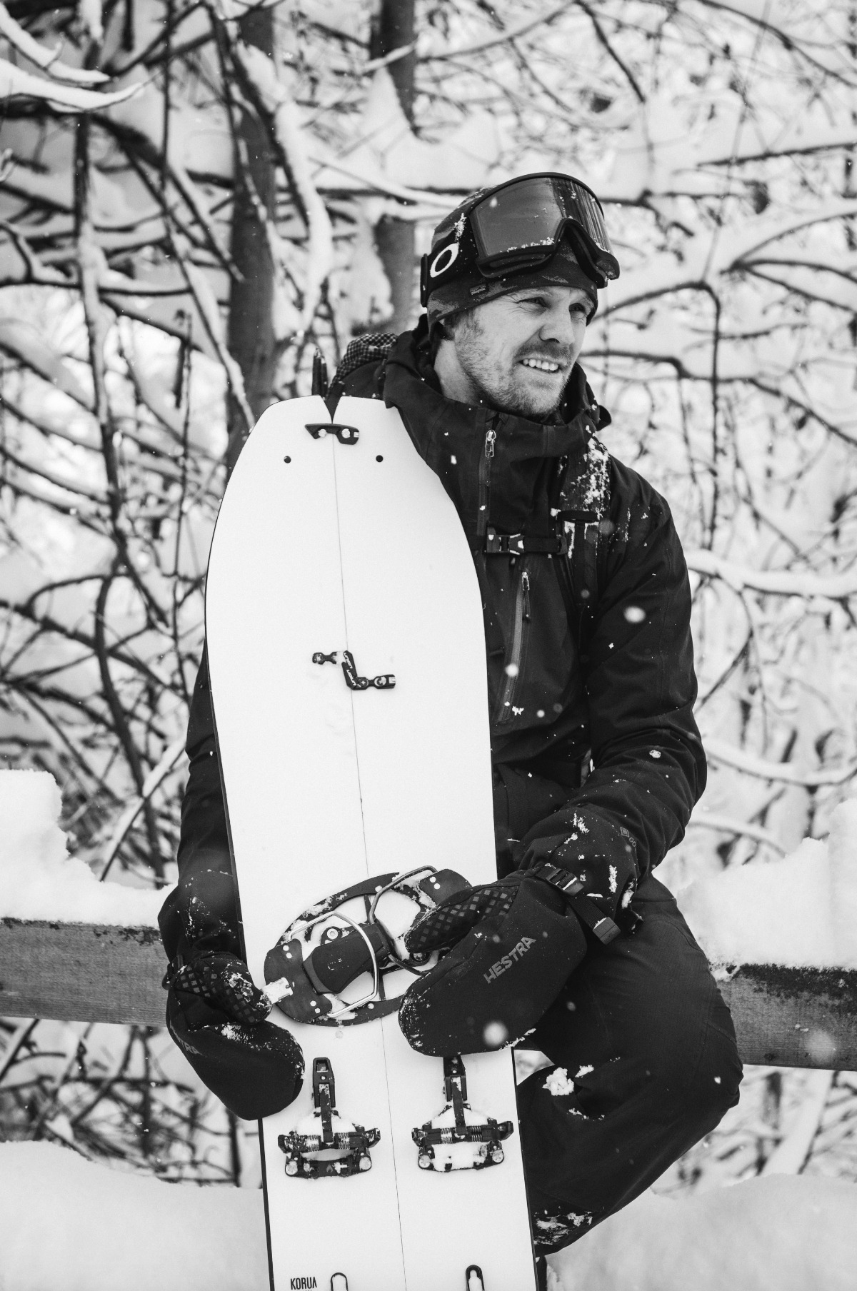 Korua Elevator Split Plus snowboard displayed in portrait, showcasing its design and construction for winter snowboarding.