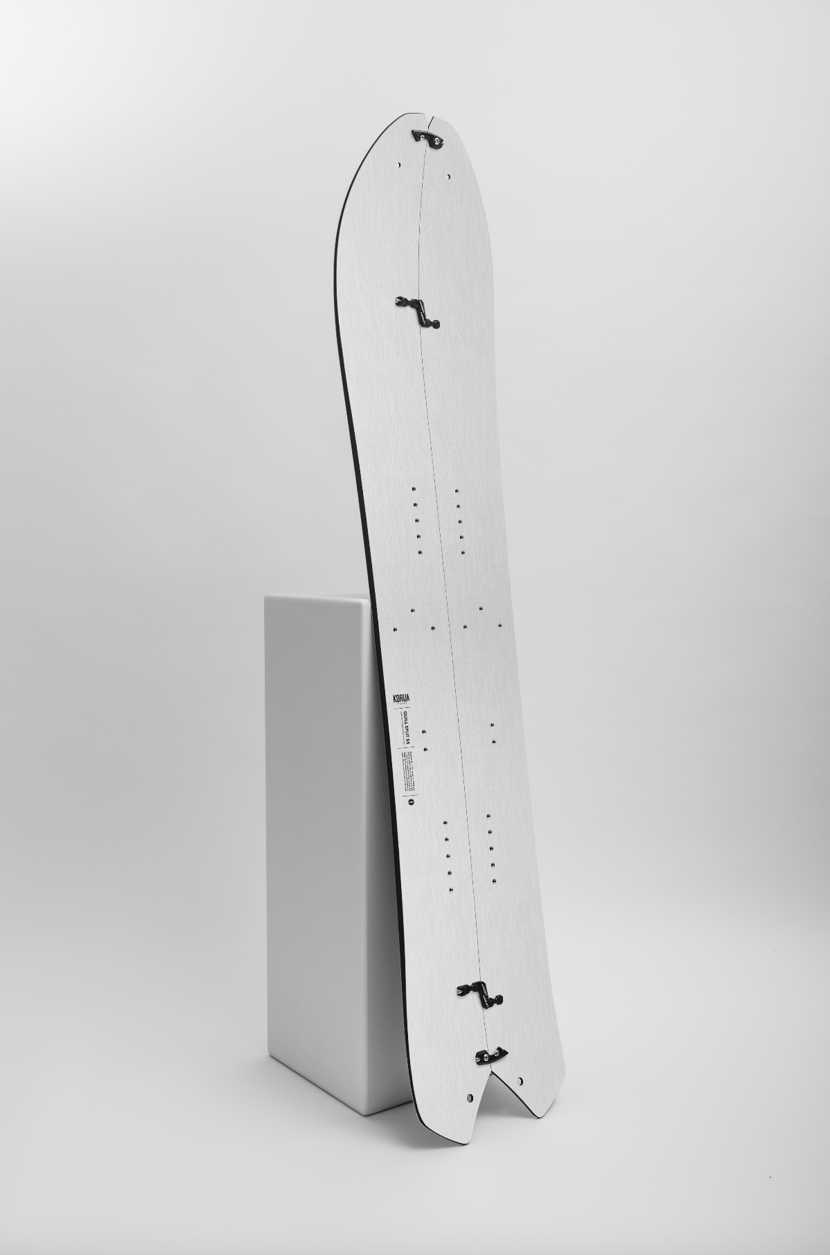 Korua Quill Split Snowboard on display, showcasing its split design and durable construction for winter snowboarding adventures.