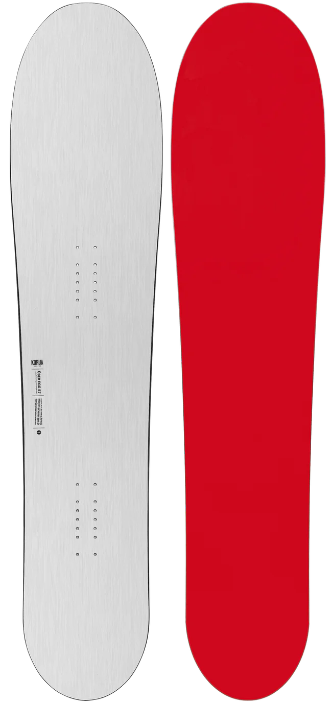 Korua Uberegg snowboard in snow, showcasing the board's unique shape and design on a snowy landscape.