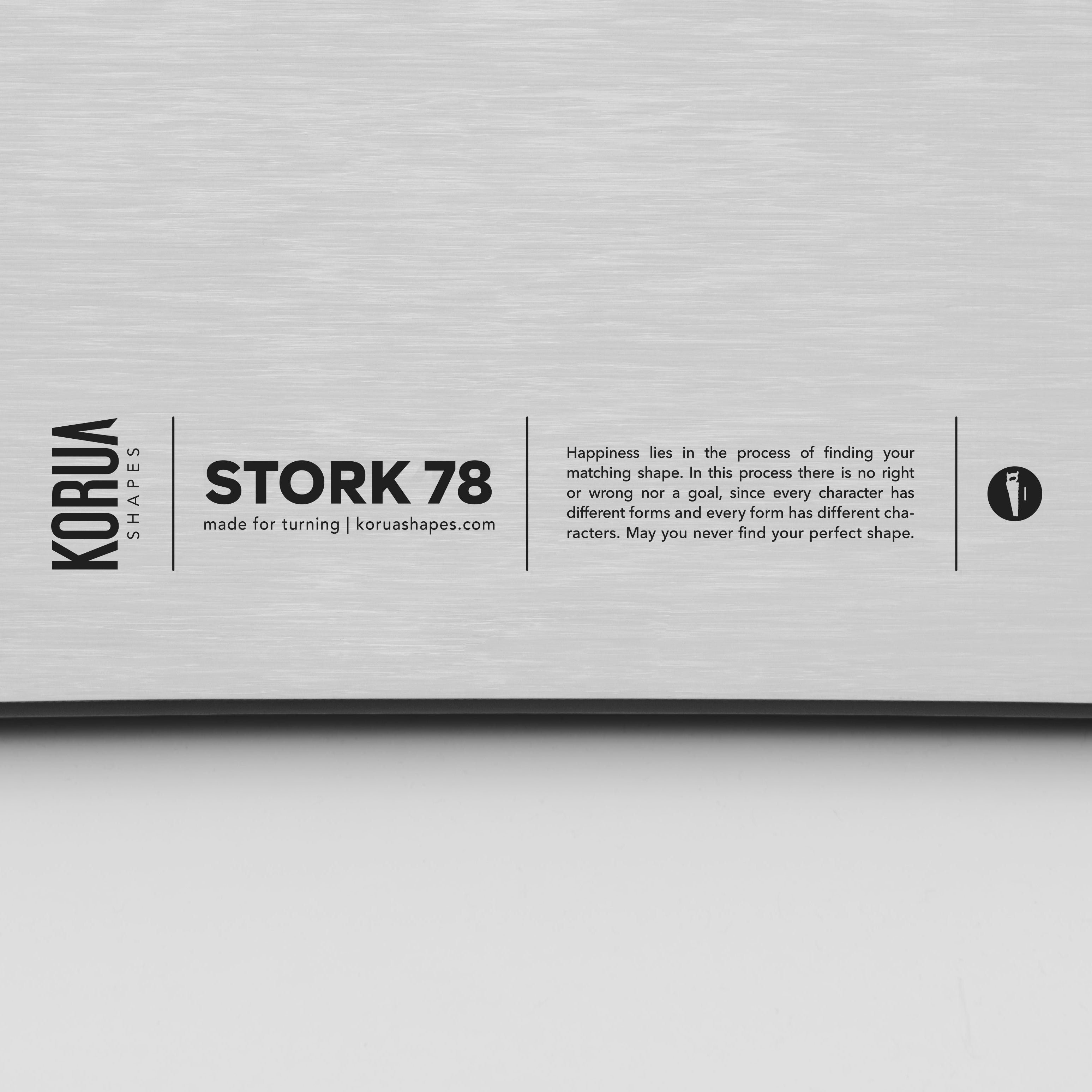 Koru Shapes stork 178 snowboard with branding and product information on the top sheet on a gray background