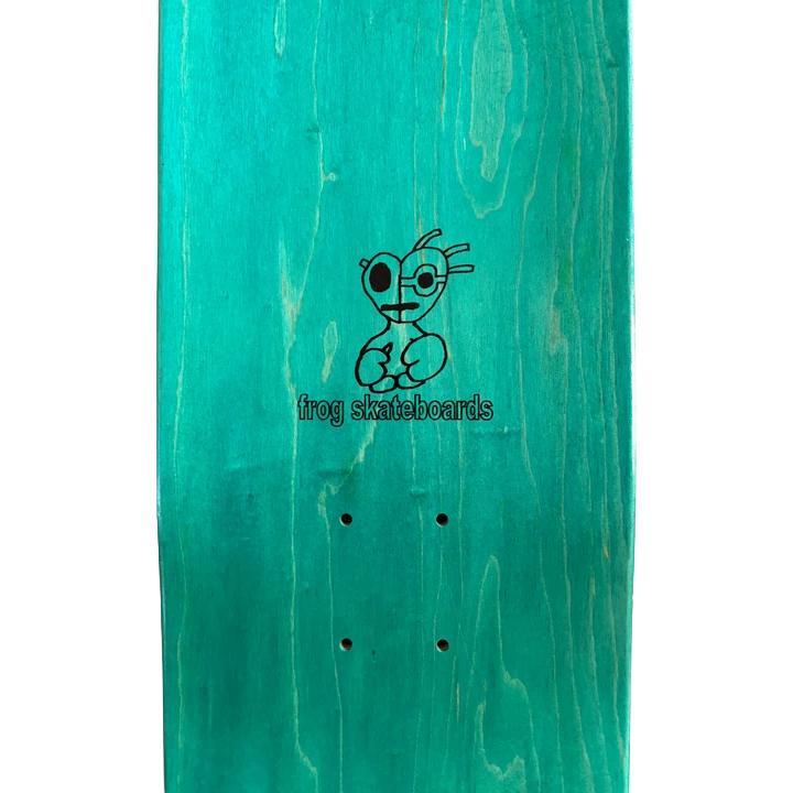 Close-up of the teal top ply on the Frog Tough Guy Nick Michel skateboard deck showing the Frog Skateboards character logo and mounting holes.