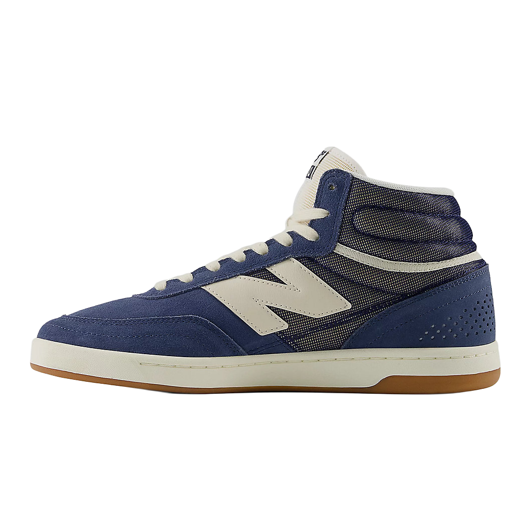Top view of the New Balance Numeric 440 High V2 skate shoe in Indigo and Sea Salt showing cream laces and padded high-top collar.