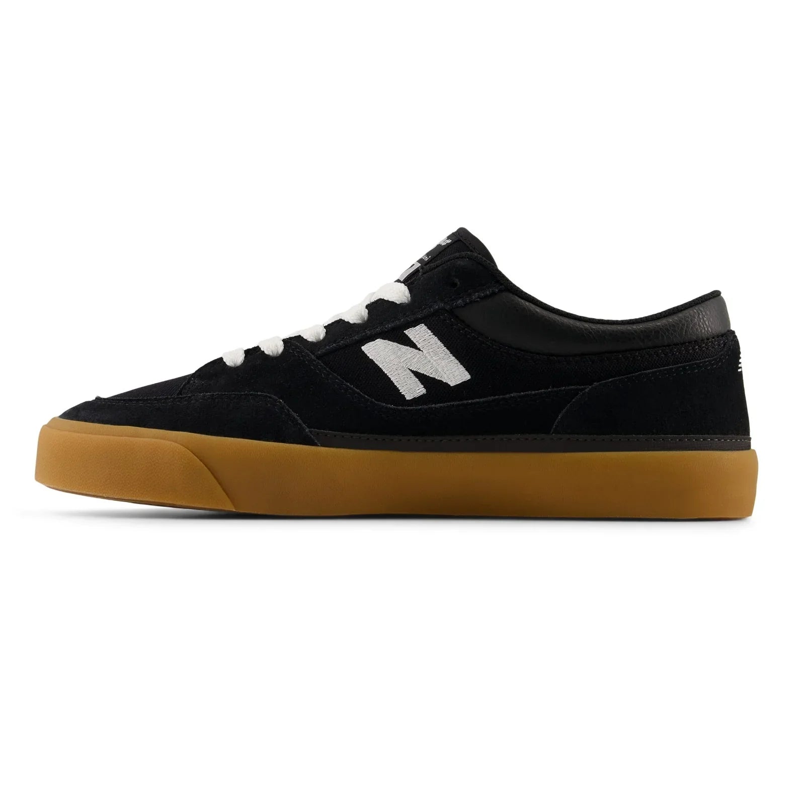 Inner side profile of the New Balance Numeric Franky Villani 417 Low in black, white and gum with white N logo and gum sole.
