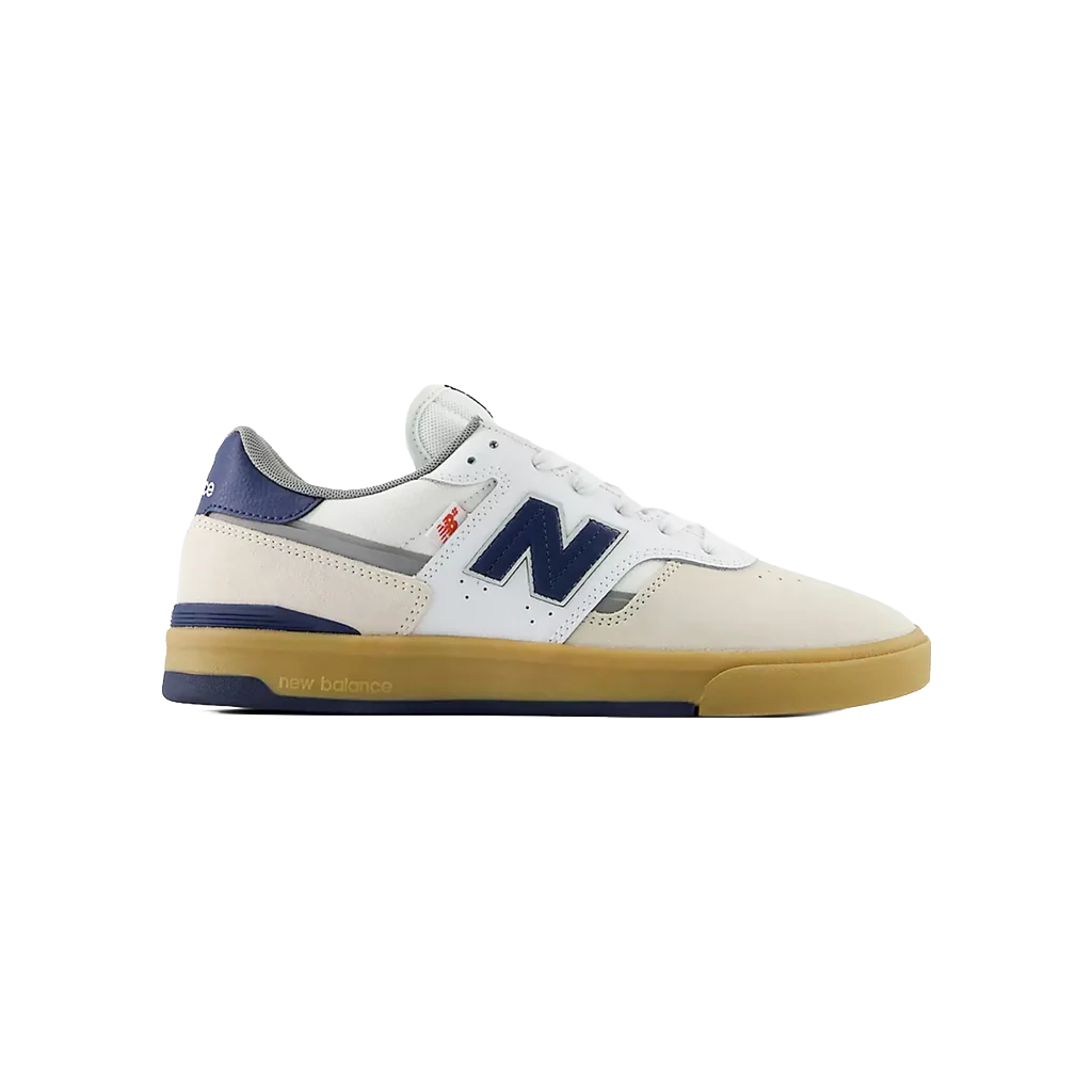 New Balance Numeric Jamie Foy 306 Cup skate shoe in white and blue, outer side profile with white suede and mesh upper, navy N logo and gum cupsole.