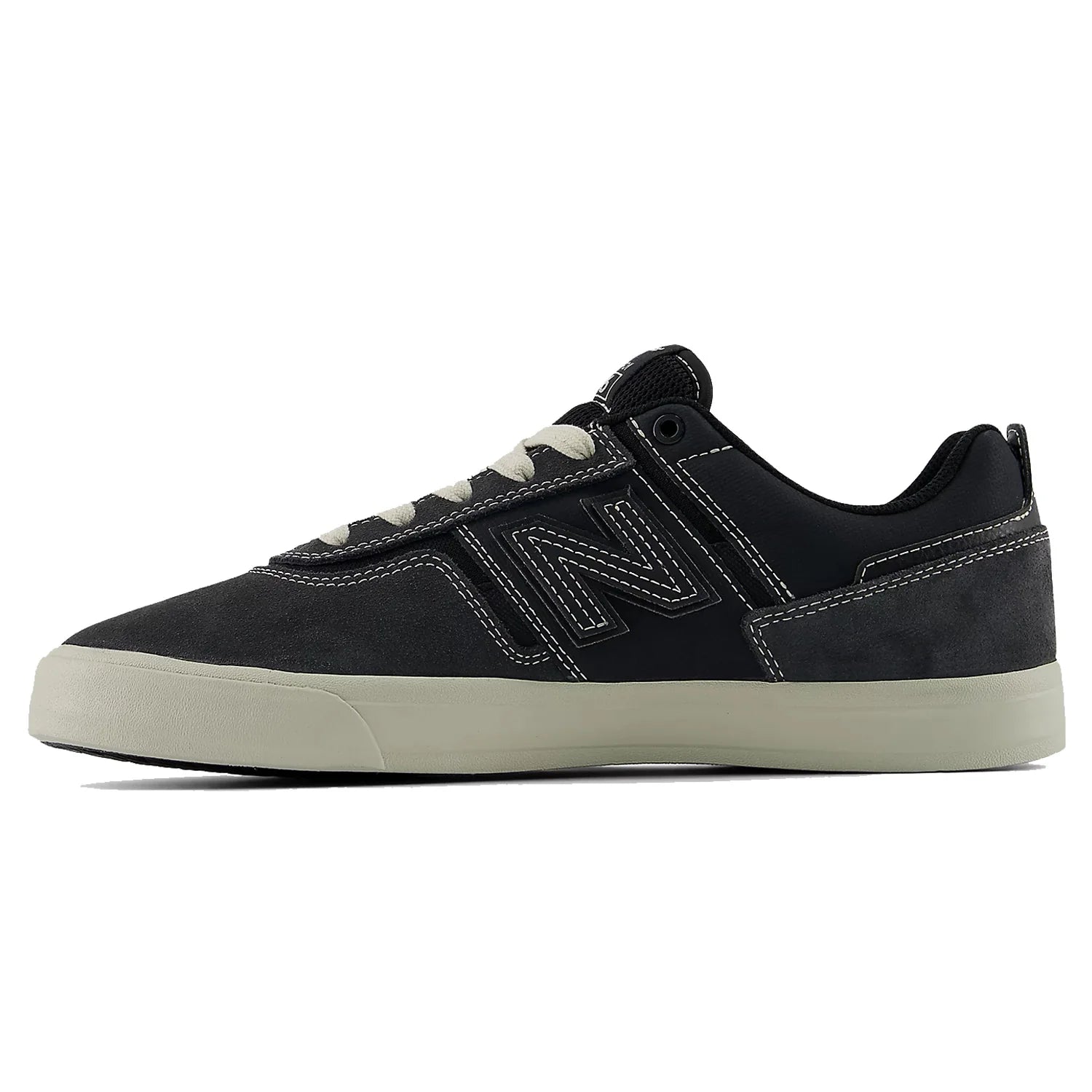Inner side profile of the New Balance Numeric Jamie Foy 306 skate shoe in grey and beige with suede upper and vulcanized sole.