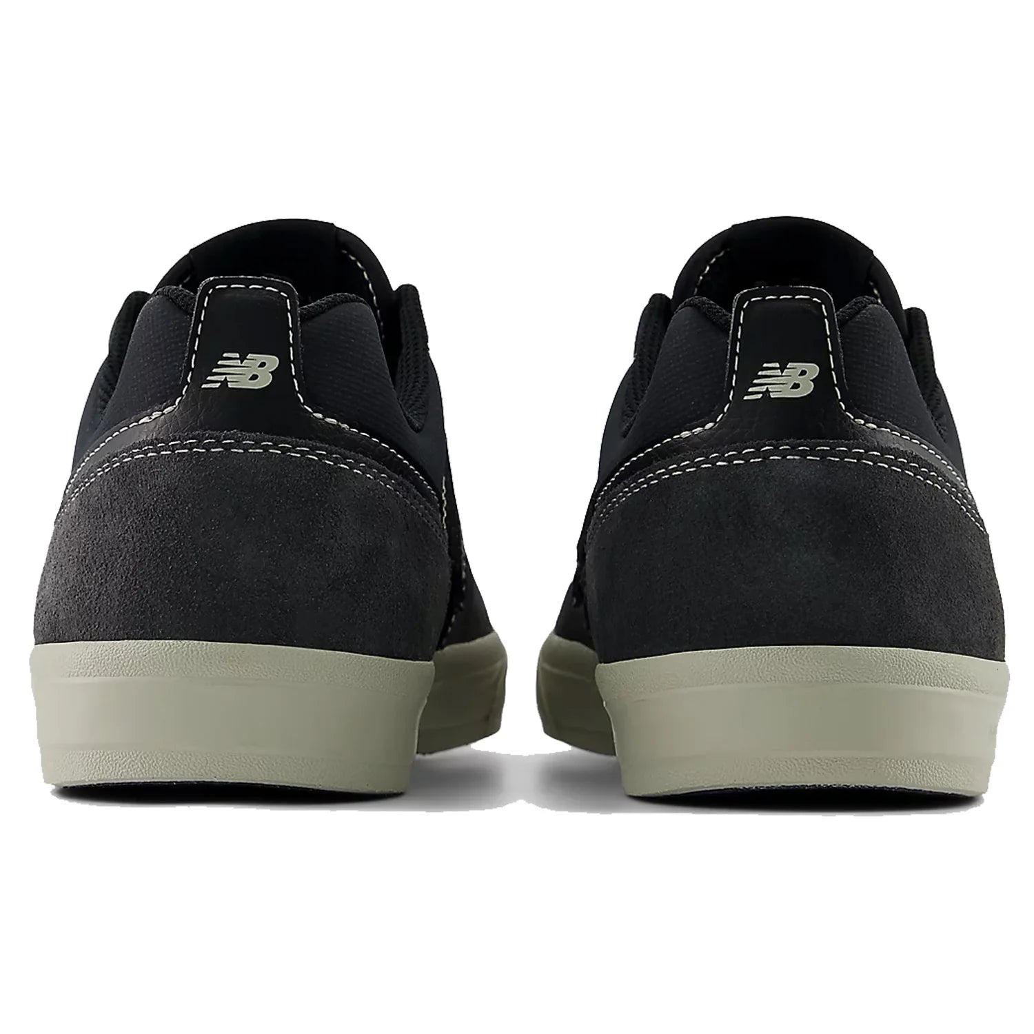 Rear view of a pair of New Balance Numeric Jamie Foy 306 skate shoes showing suede heel panels, NB branding and beige midsoles.