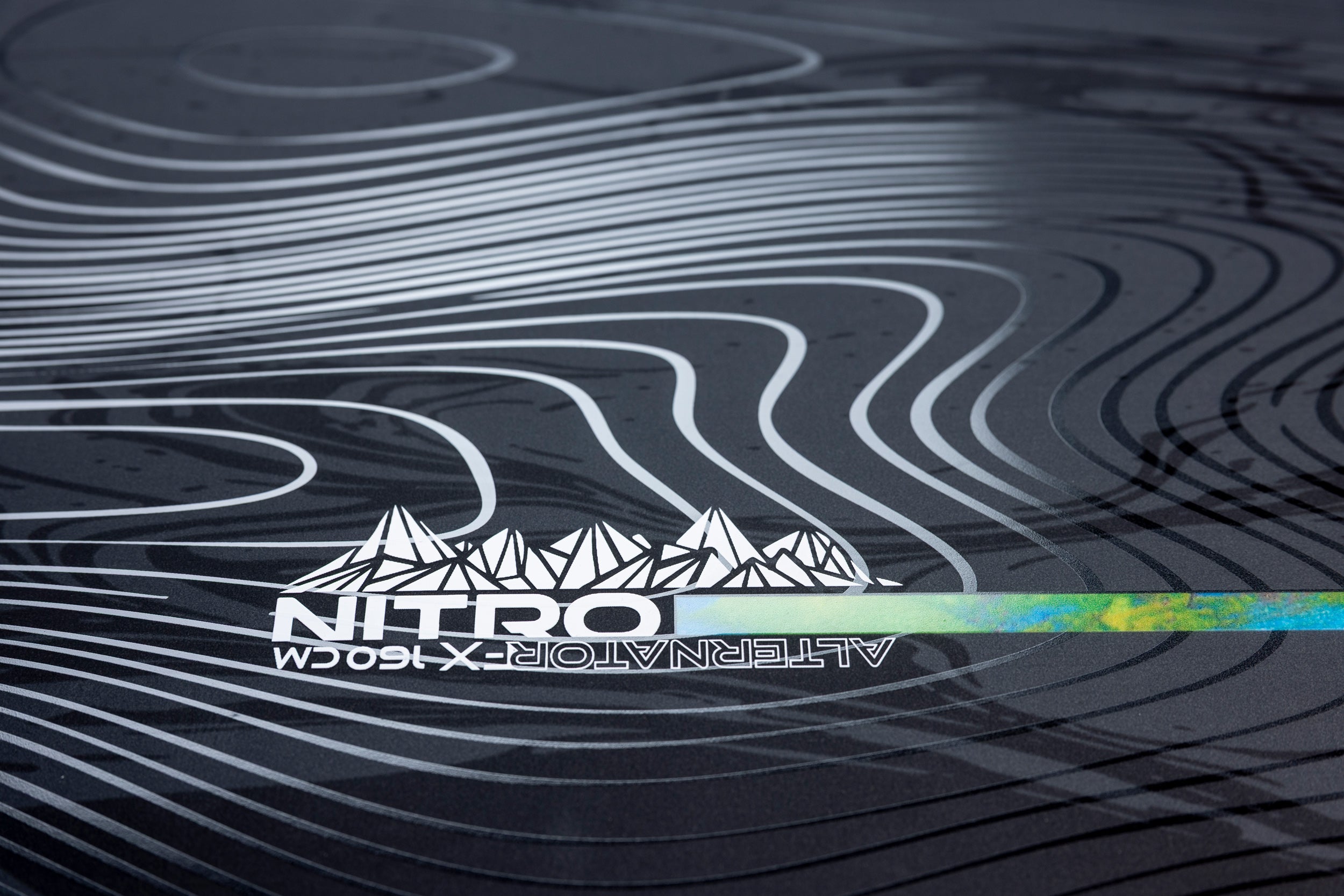 Nitro Alternator FX Snowboard 2027 with detailed branding, showcasing its sleek design and snow-ready construction.