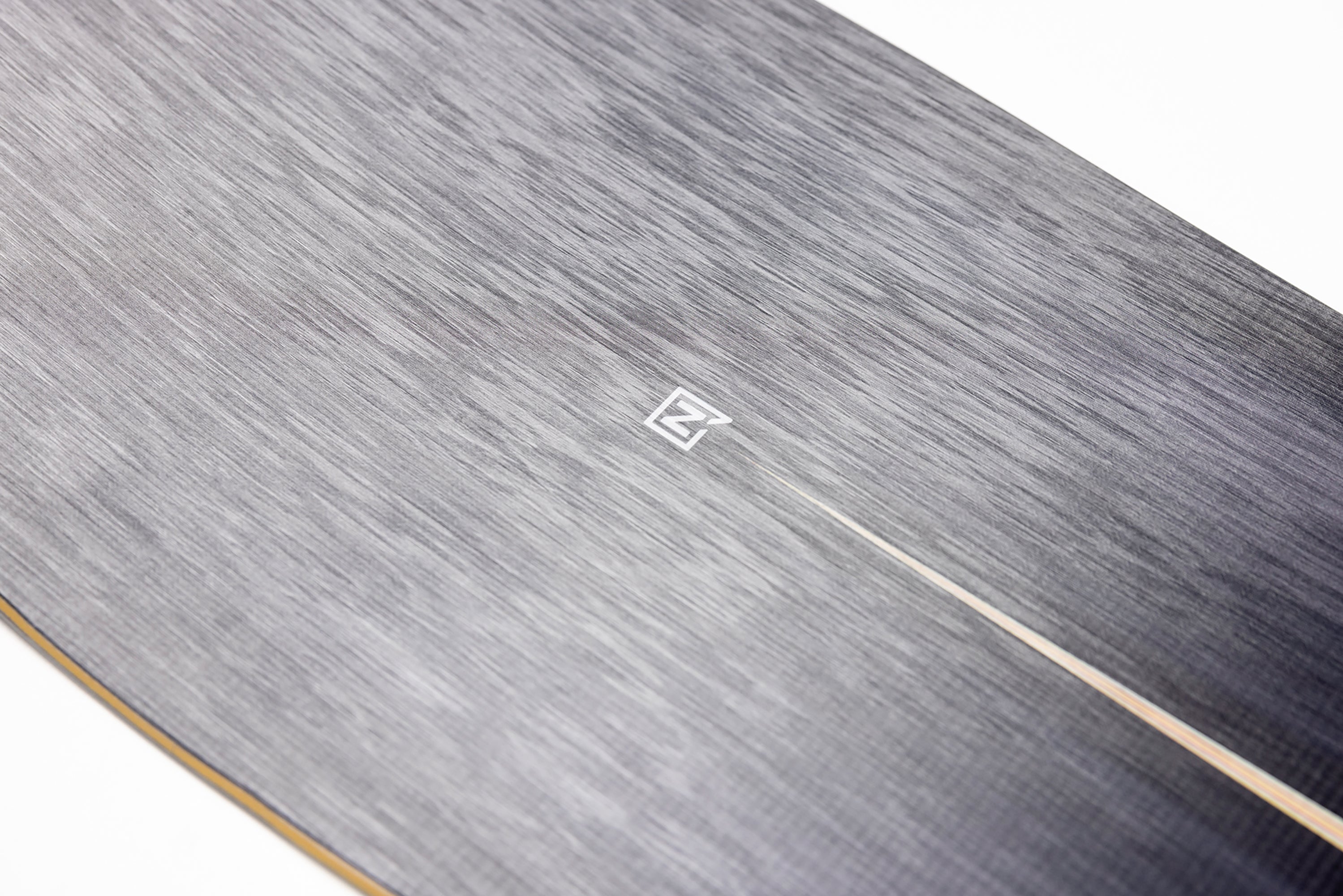 Nitro Squash Snowboard 2027 with detailed view of the nose and top sheet, showcasing the snowboard's design and graphics.