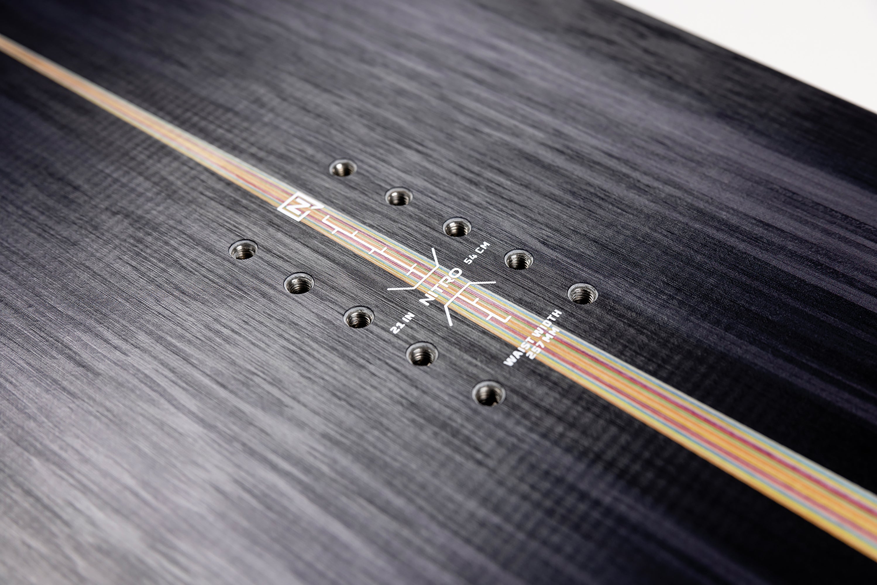 Nitro Squash Snowboard 2027 with rear binding inserts and camber detail, designed for snowboarding performance.