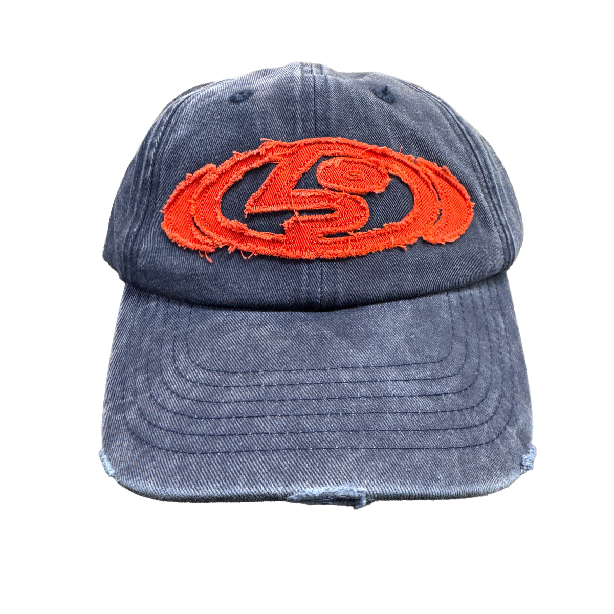 PUBLIC Snowboards Distressed Logo Cap in Navy shown from the front with washed navy fabric, curved brim and large distressed red PUBLIC logo embroidery.
