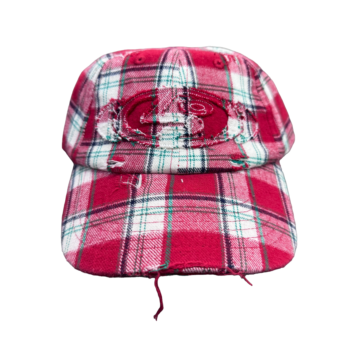 PUBLIC Snowboards Distressed Logo Cap in Red and Plaid shown from the front with distressed PUBLIC logo embroidery and plaid fabric detailing.