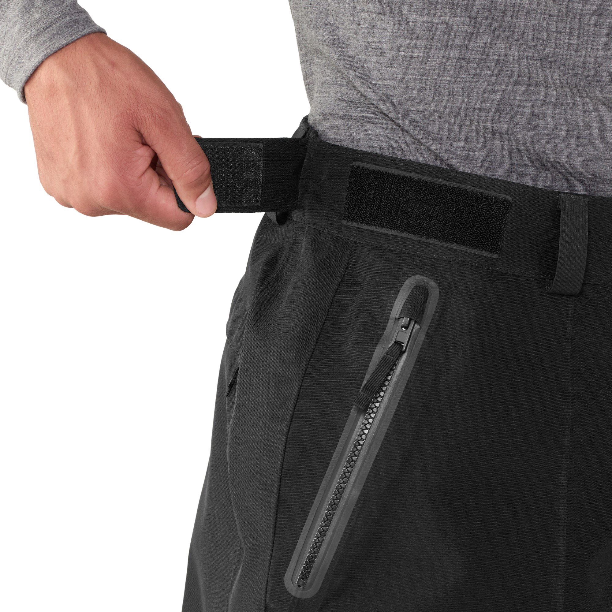 Close-up of the hook-and-loop adjustable waist tab and AquaGuard zippered hand pocket on The North Face Men’s GORE-TEX Hex Pants.