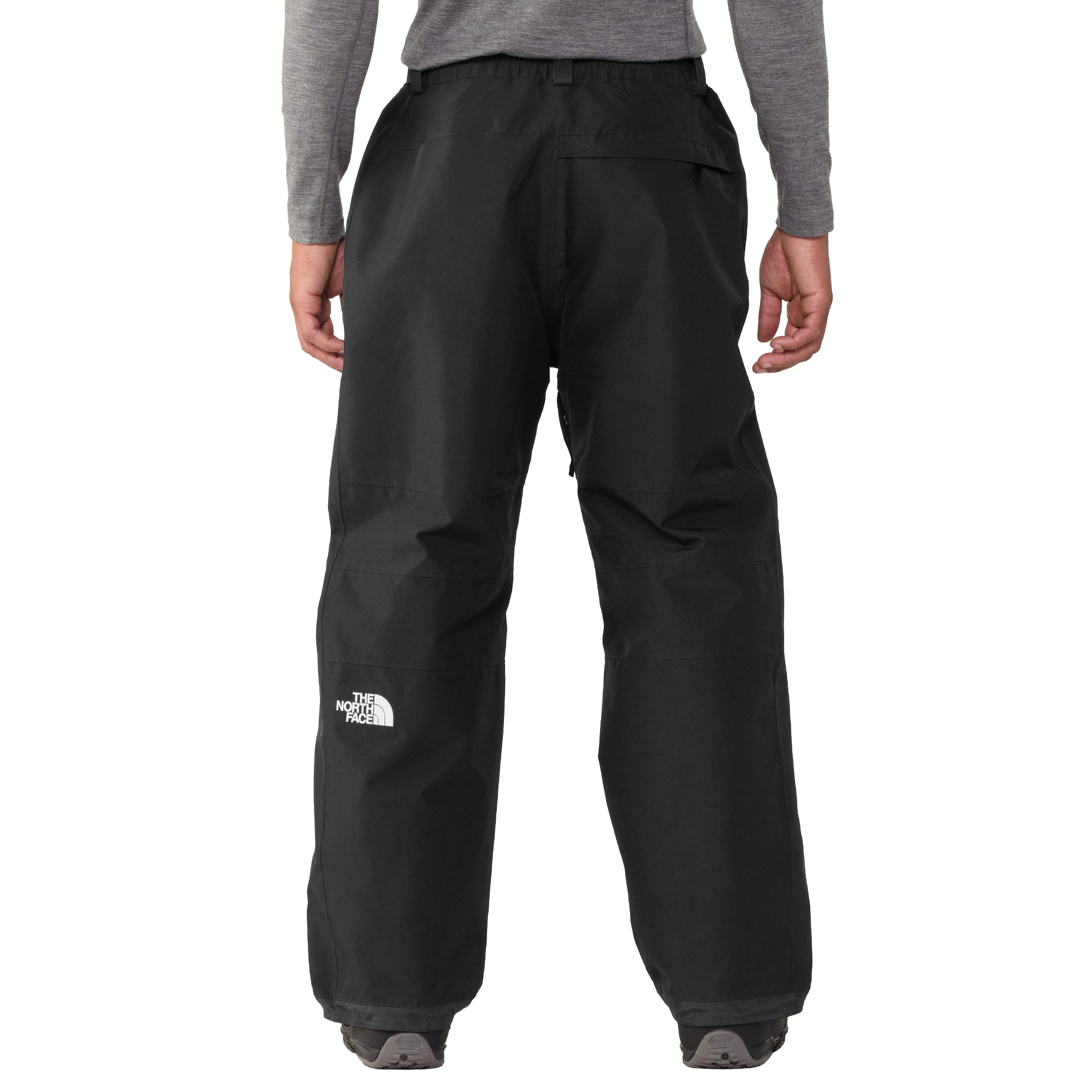 Rear on-body view of The North Face Men’s GORE-TEX Hex Pants in TNF Black showing the relaxed straight-leg fit and rear pocket.