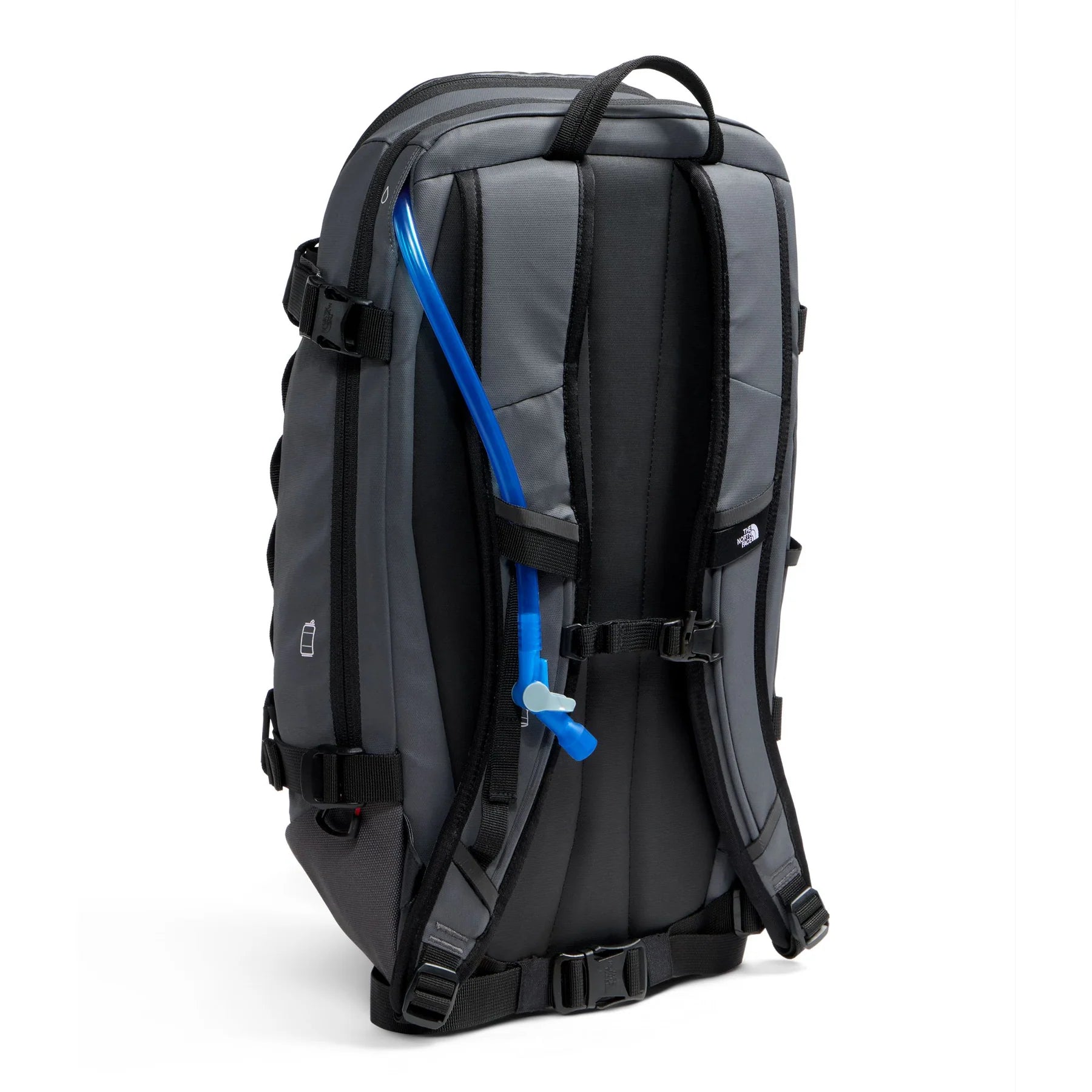 Rear three-quarter view of The North Face Snowdrift 22 + 6 showing the padded back panel, shoulder straps, waist strap and routed hydration hose.