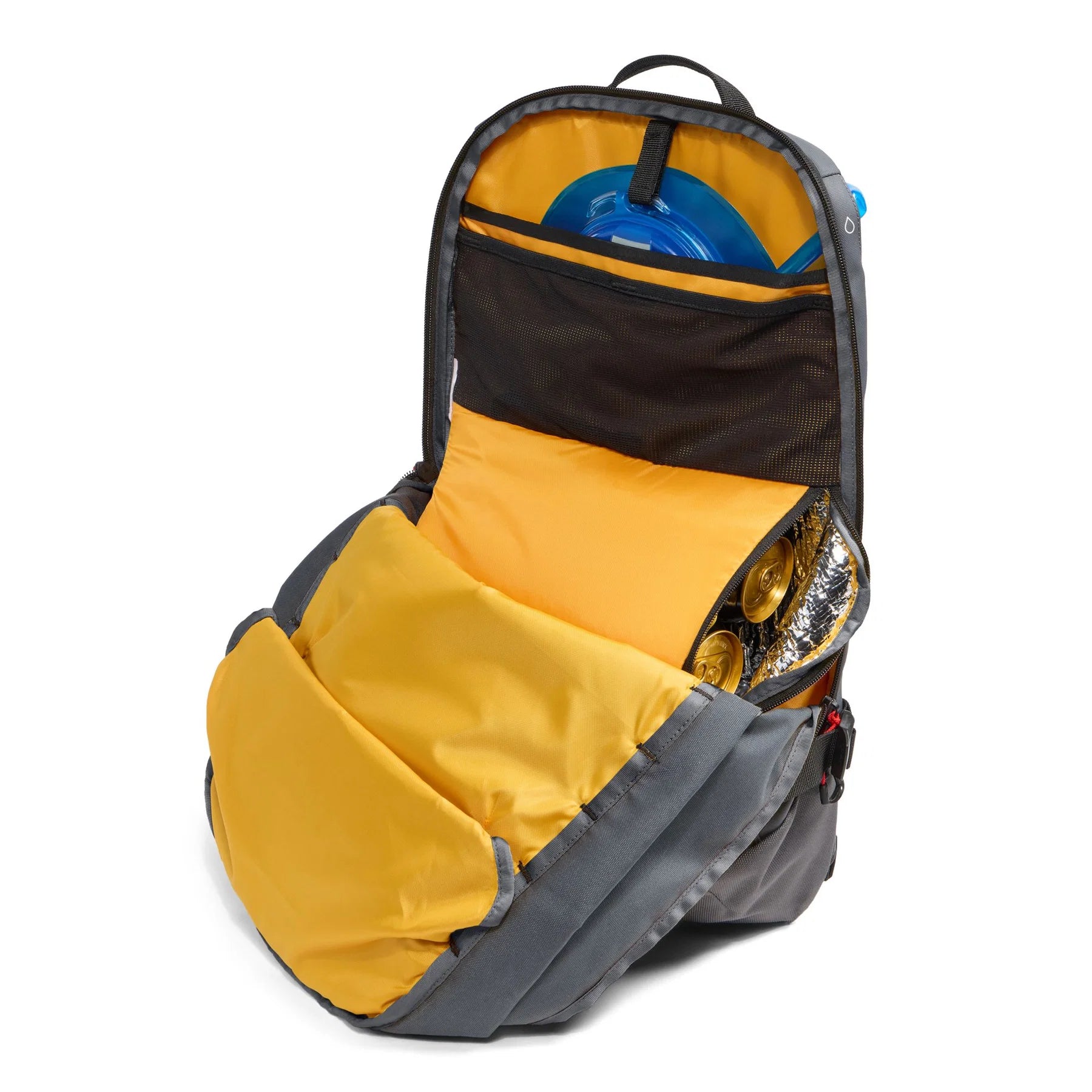 Open main compartment of The North Face Snowdrift 22 + 6 snow backpack showing yellow interior lining, mesh storage and hydration reservoir sleeve.