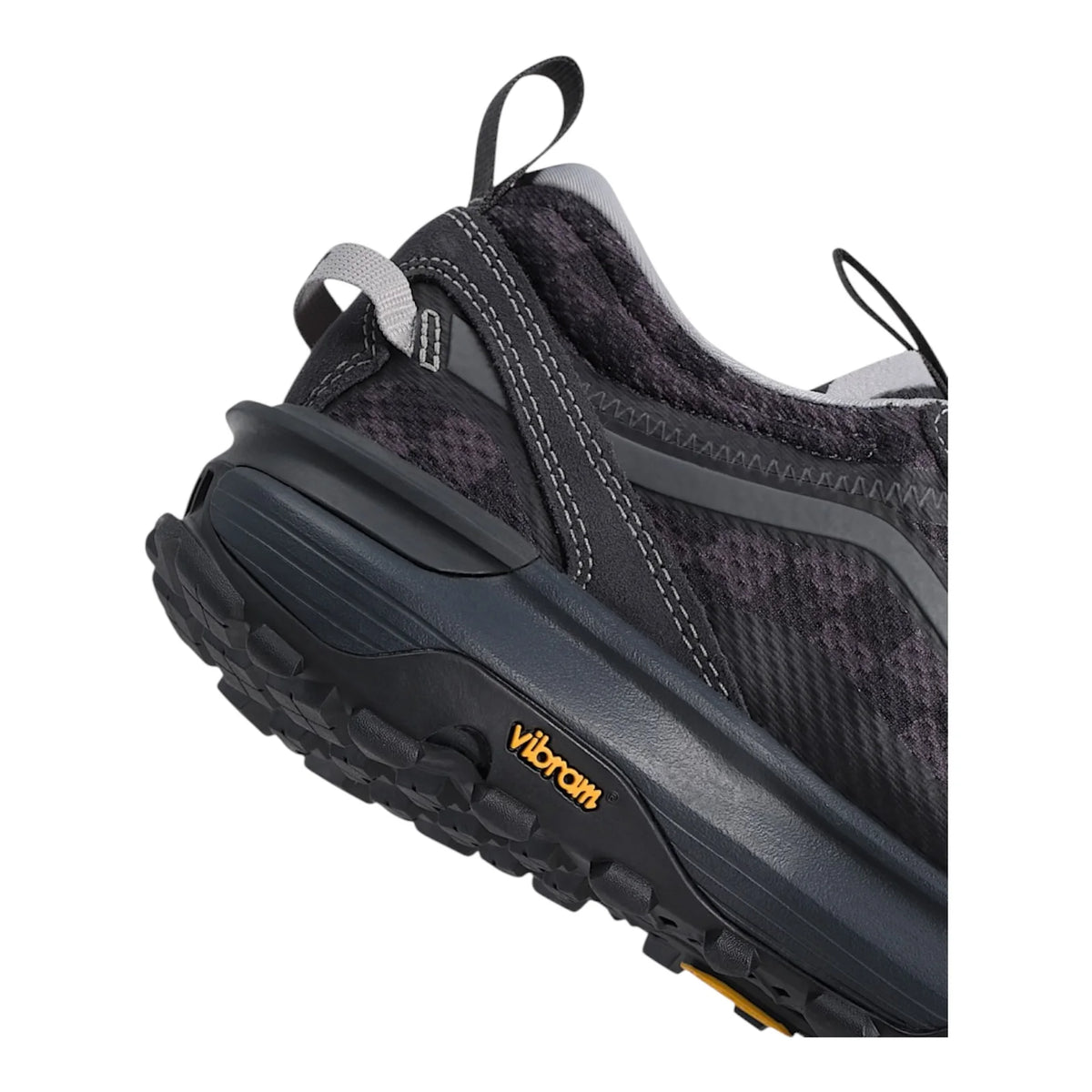 Close-up of the reinforced heel, rear pull tab, cushioned midsole and Vibram outsole on the Vans Crosspath XC shoe.