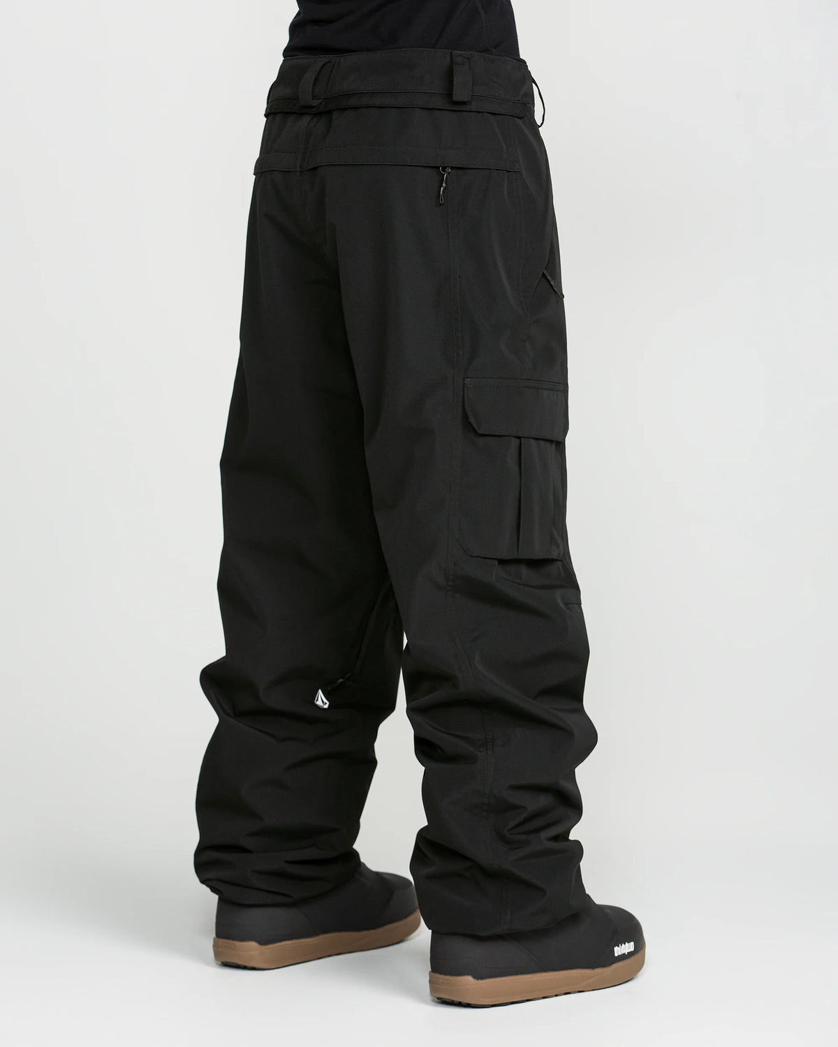 Volcom Liftline 20K Pant 2027 in Black shown from a rear three-quarter angle with cargo pocket, rear zip pocket and relaxed snowboard fit.