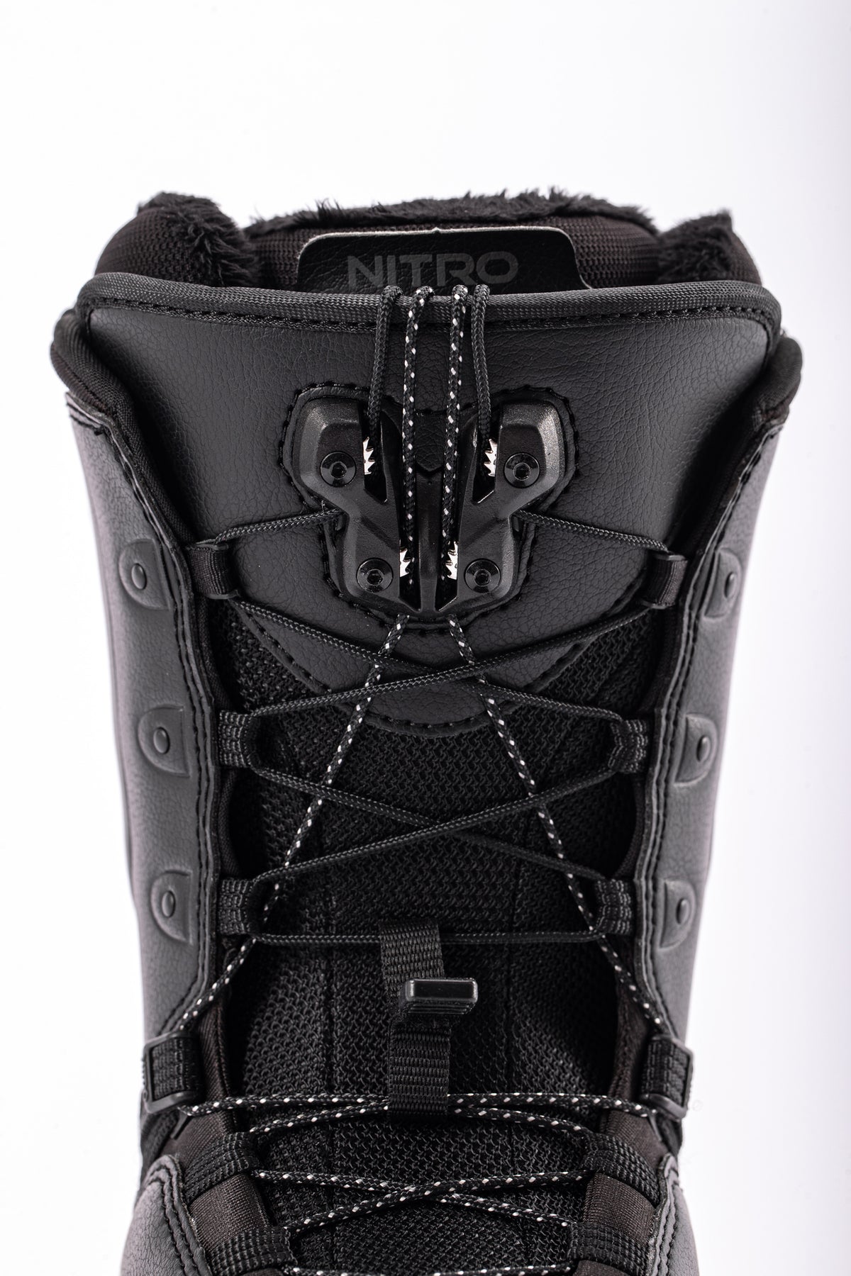 Nitro Crown TLS women's snowboard boots in black with lace-up design and padded collar, designed for snowboarding comfort.