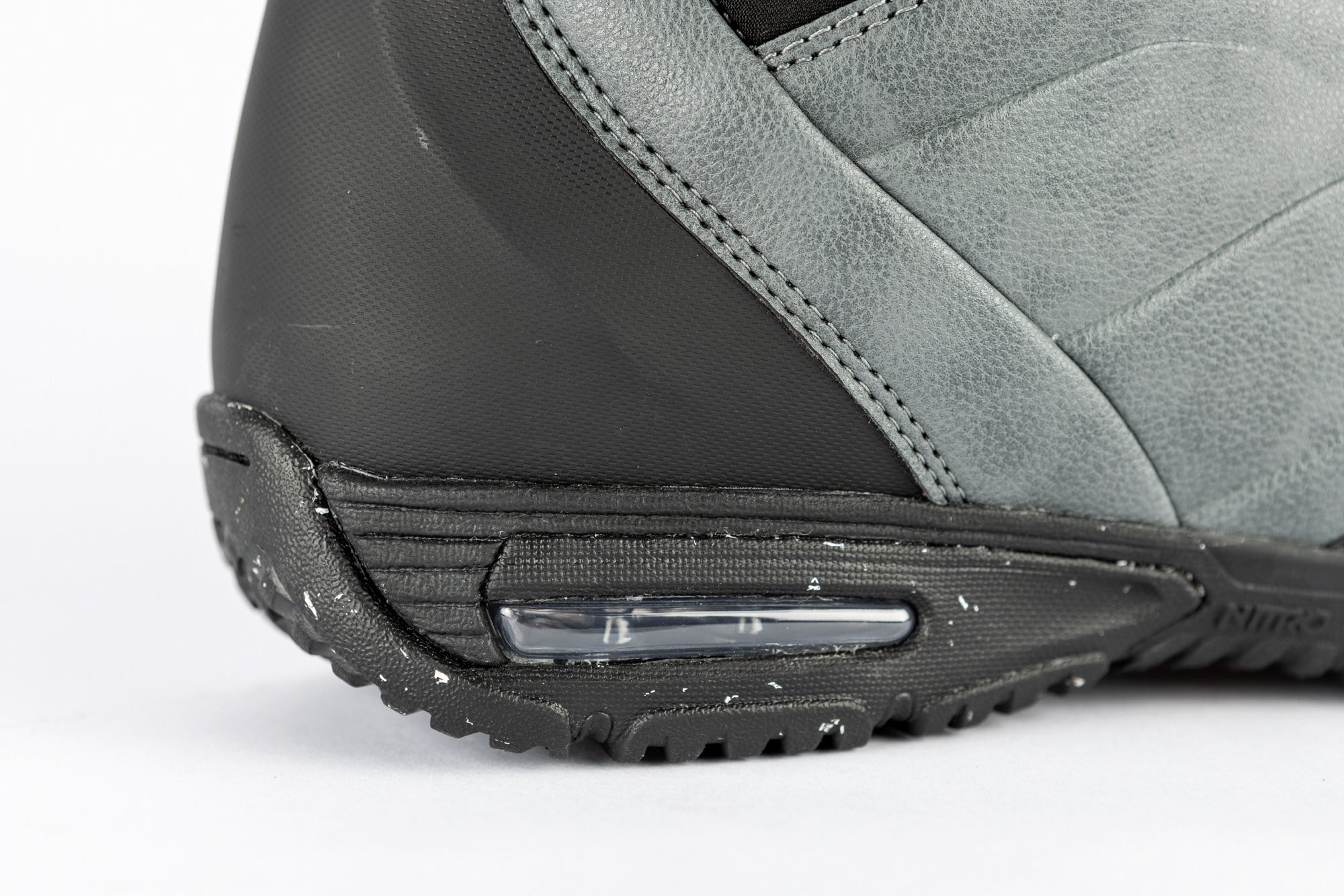 Nitro Select Boa snowboard boot from the 2027 collection, showing the heel and side view with black and white design details.