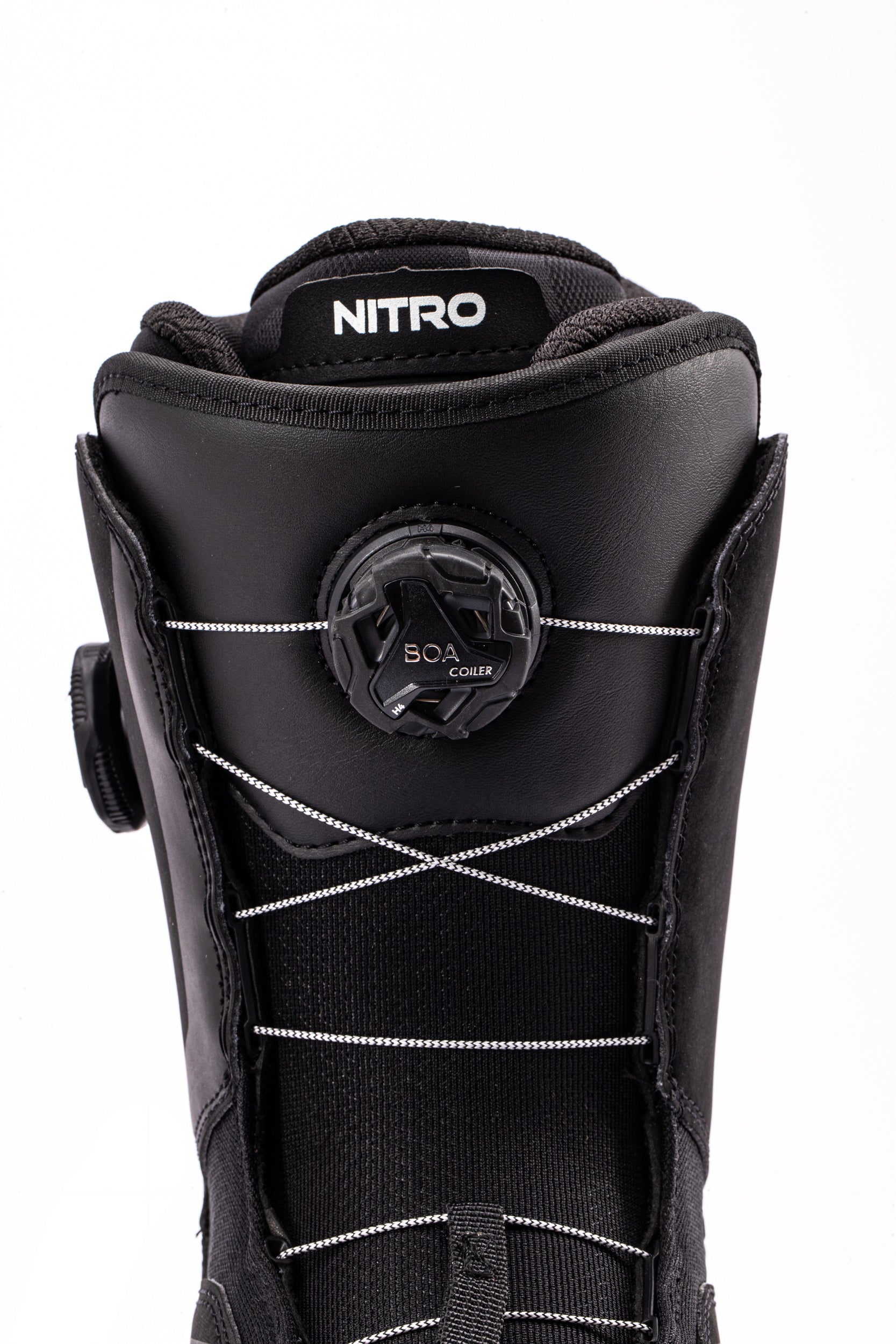 Black Nitro Sentinel Boa snowboard boots from the front, showing the lacing system and sleek design for snowboarding.