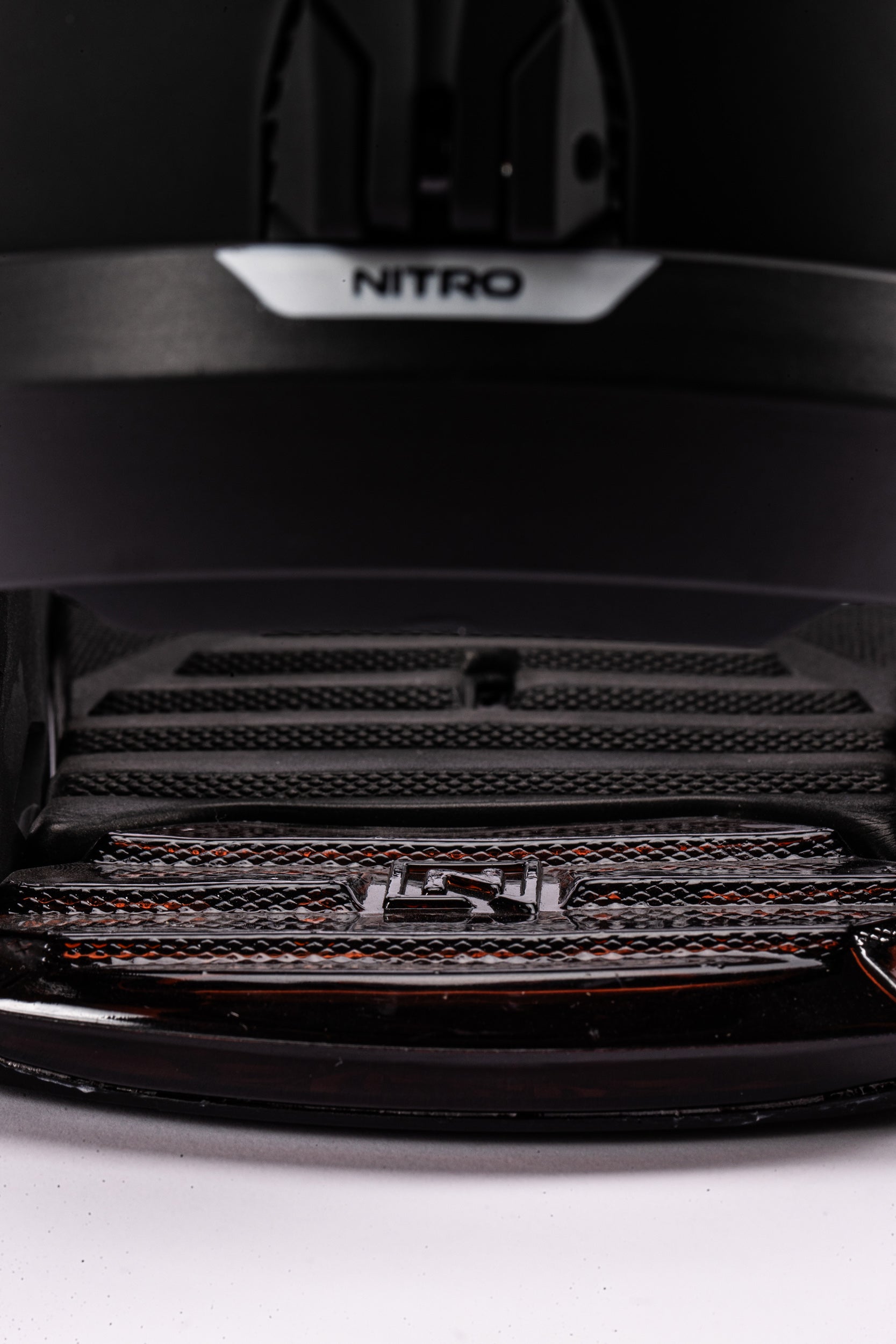 Black Nitro Team snowboard bindings for 2027 with heel strap and high-back support, designed for all-mountain snowboarding.