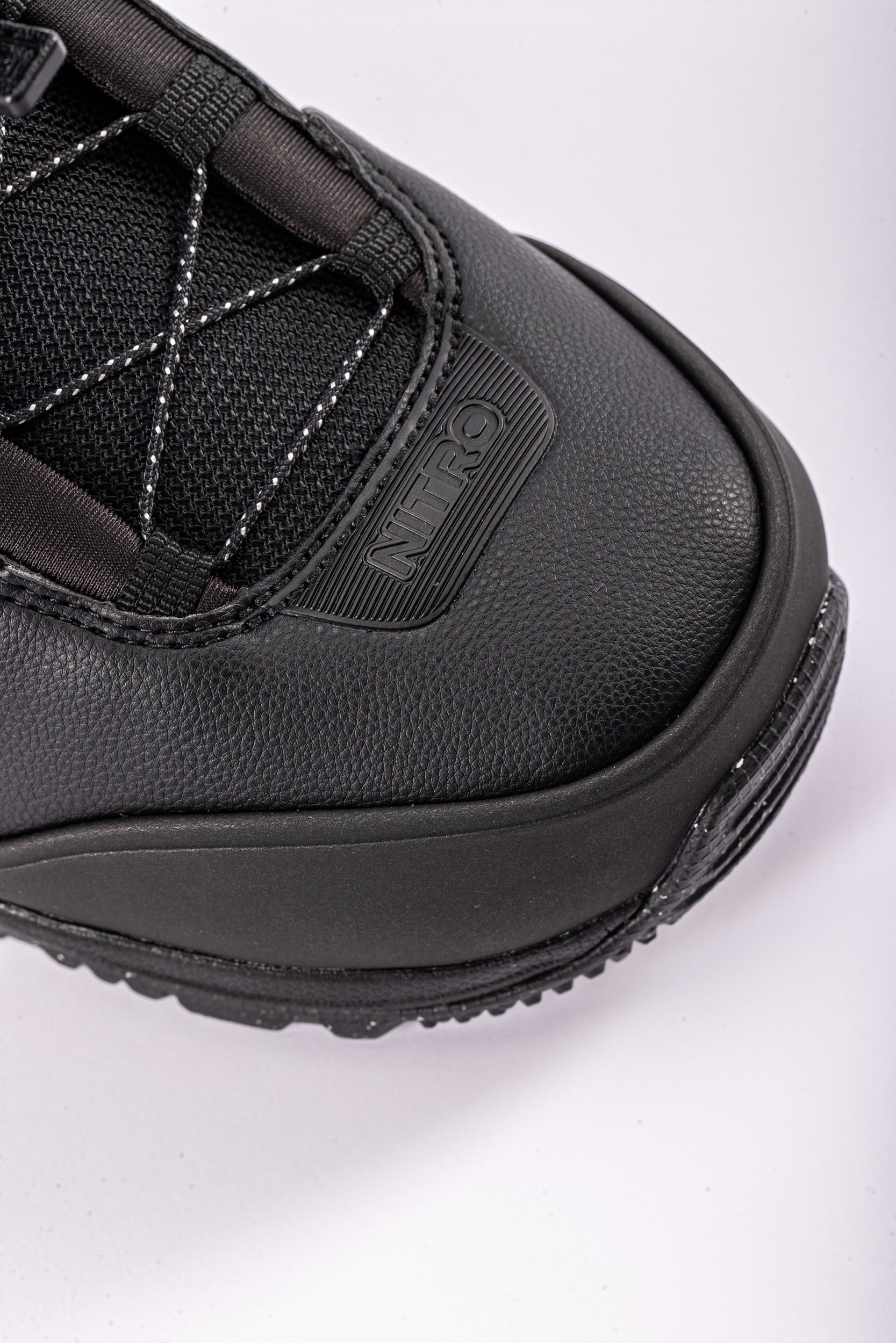 Black Nitro Team TLS snowboard boot with reinforced toe and sleek design, ideal for snowboarding in 2027.