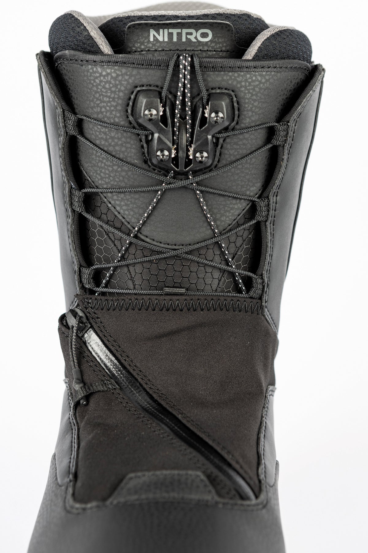 Black Nitro Venture Pro TLS snowboard boots designed for snowboarding, featuring a secure lacing system and sturdy construction.