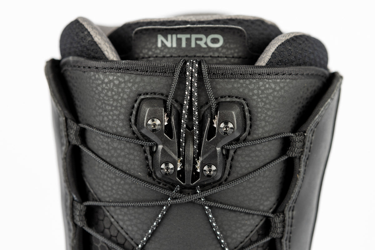 Black Nitro Venture Pro TLS snowboard boots for snowboarding, featuring secure lacing system and padded interior.